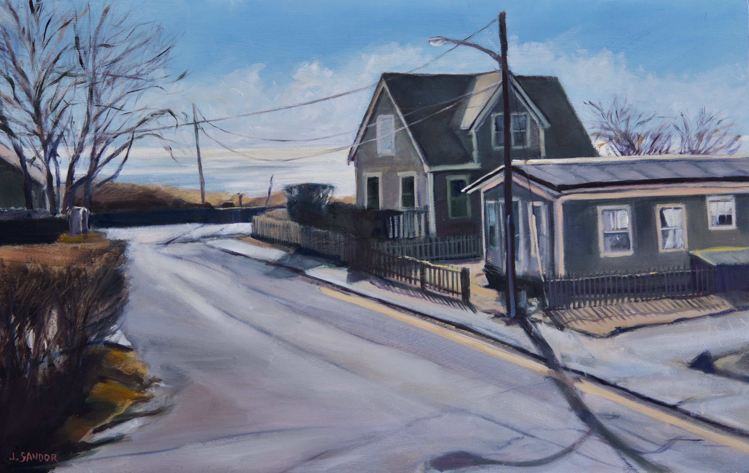 A painting of a  scene featuring a two-story house with a dark-colored roof and multiple windows, a disconnected utility pole with wires, leafless trees, and a clear sky with some clouds, with the artist's signature 'J. Sandor' in the bottom left corner.