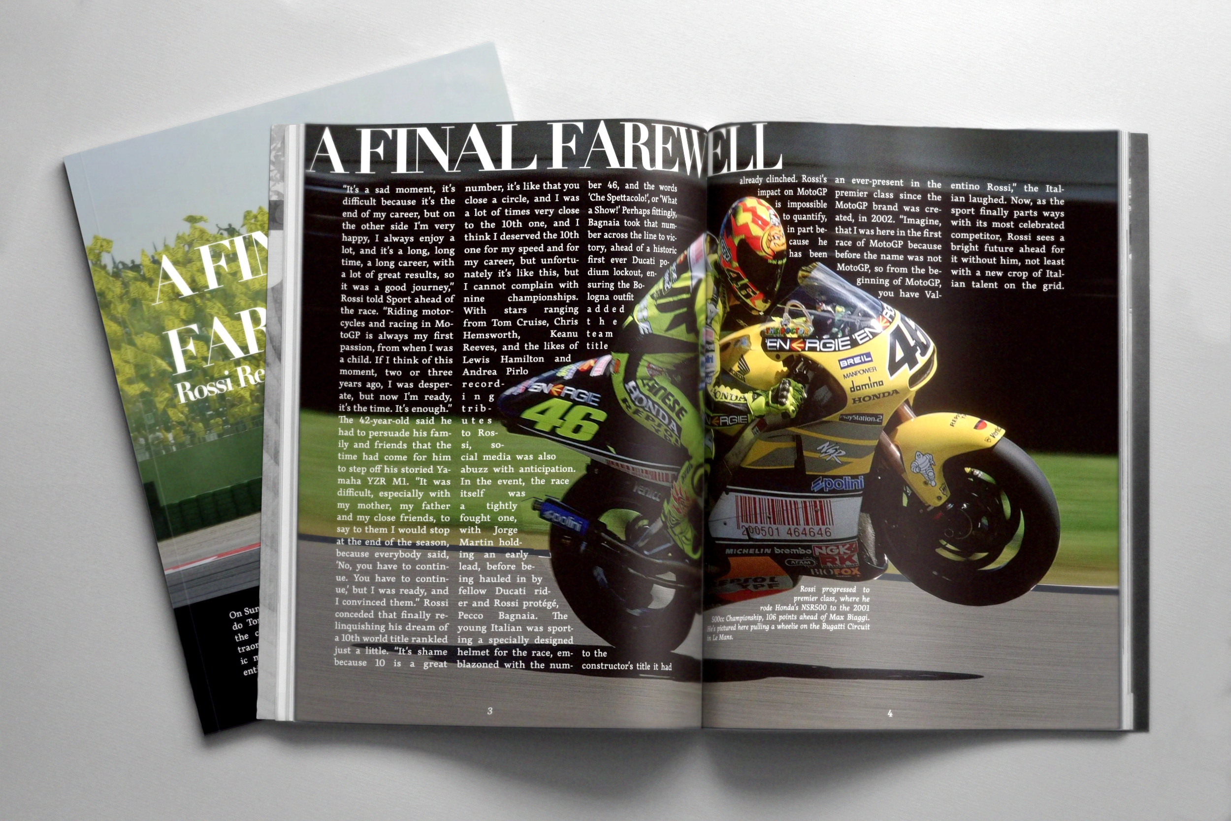 Open magazine featuring an article about motorcycle racing, with a photograph of a motorcyclist in racing gear on a yellow motorcycle, wearing a helmet, in a curve of a racetrack.