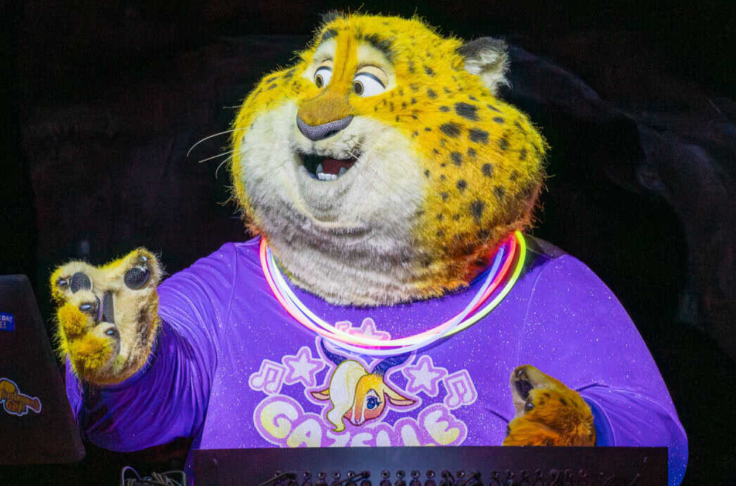 Audio Animatronic Character's Fantasic shirt- in the DJ booth of a new attractions in Florida. 
Sublimated on a glitter infused velvet, this shirt was carefully designed and color matched to the film.  
