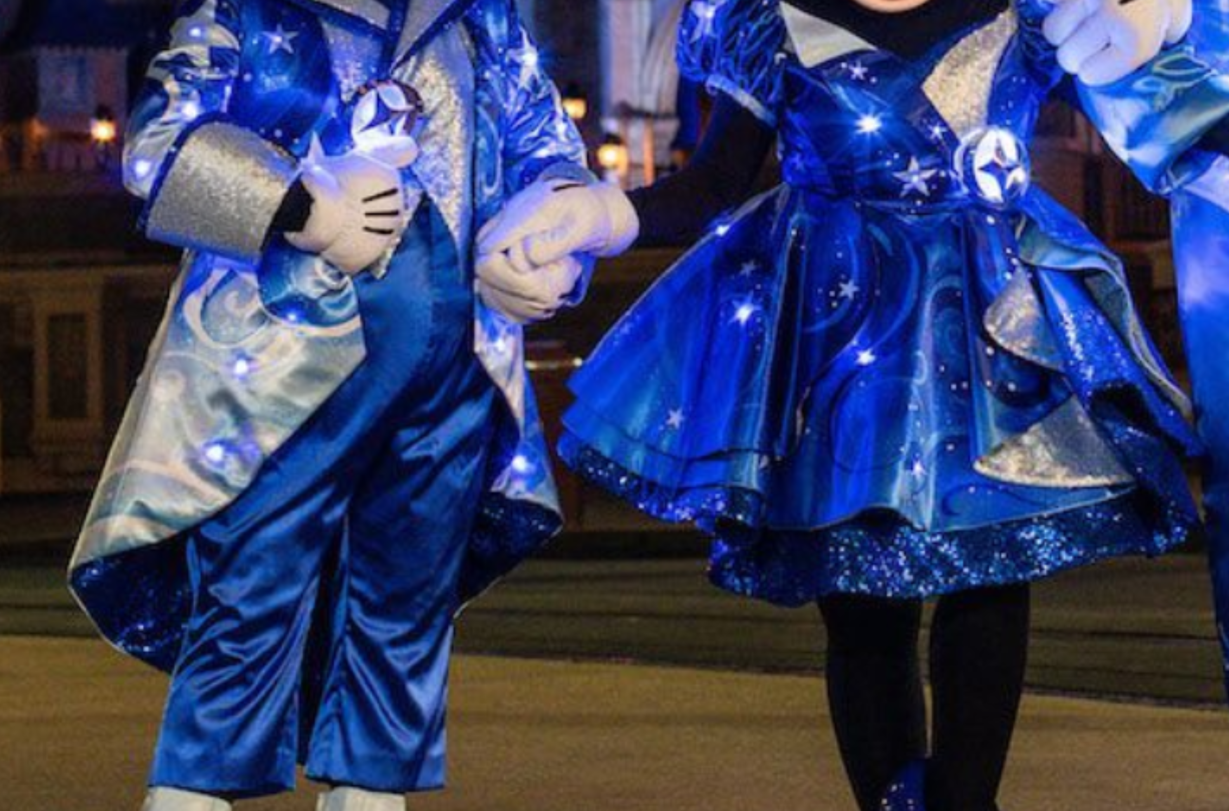 Staring in a light up night time parade, are leading duo shine in complex prince of swirling blues, whites, and silvers custom printed on sparkling fabric. 