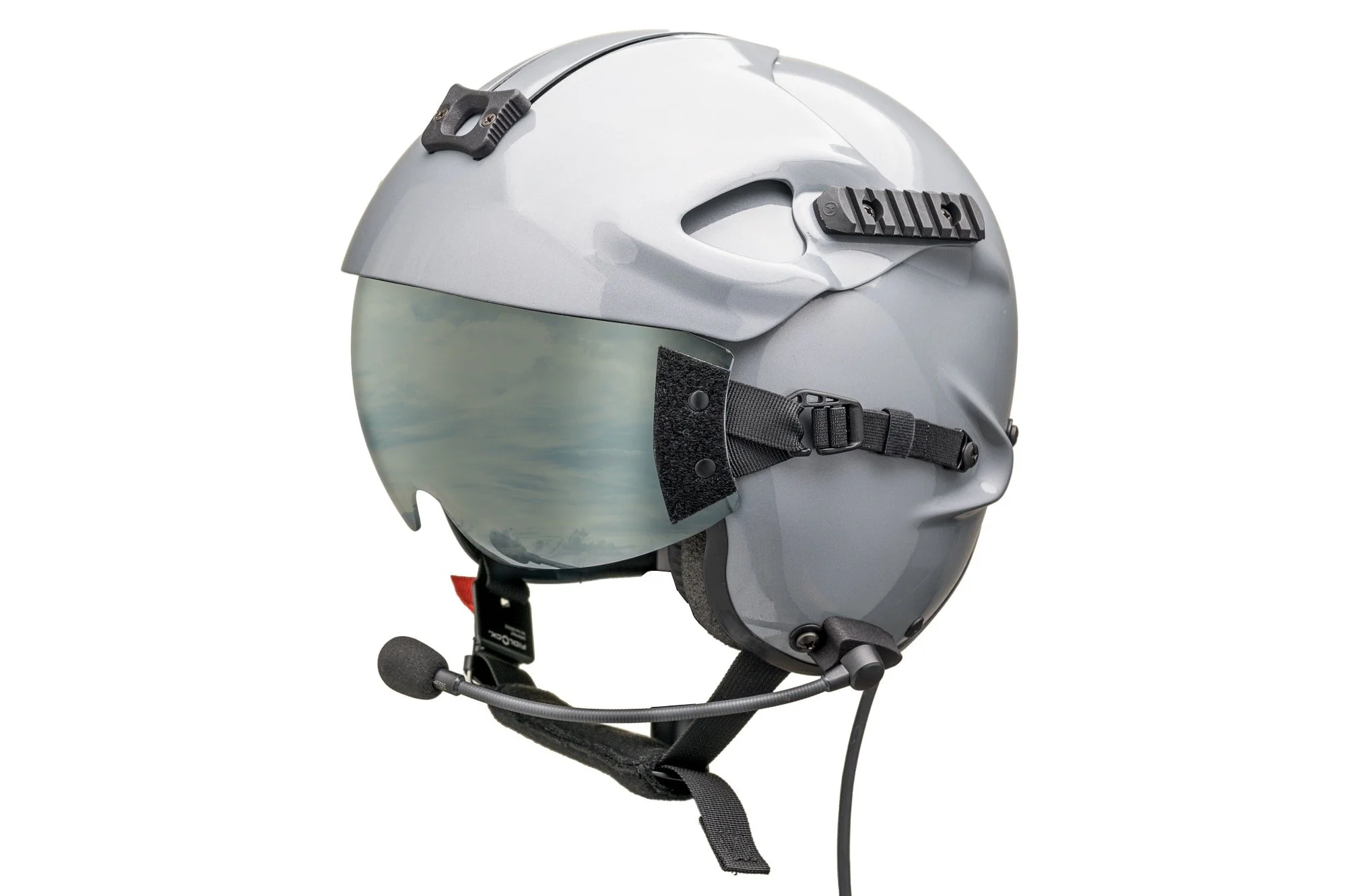 Gray motorcycle helmet with a reflective visor, black straps, and fastening buckle.