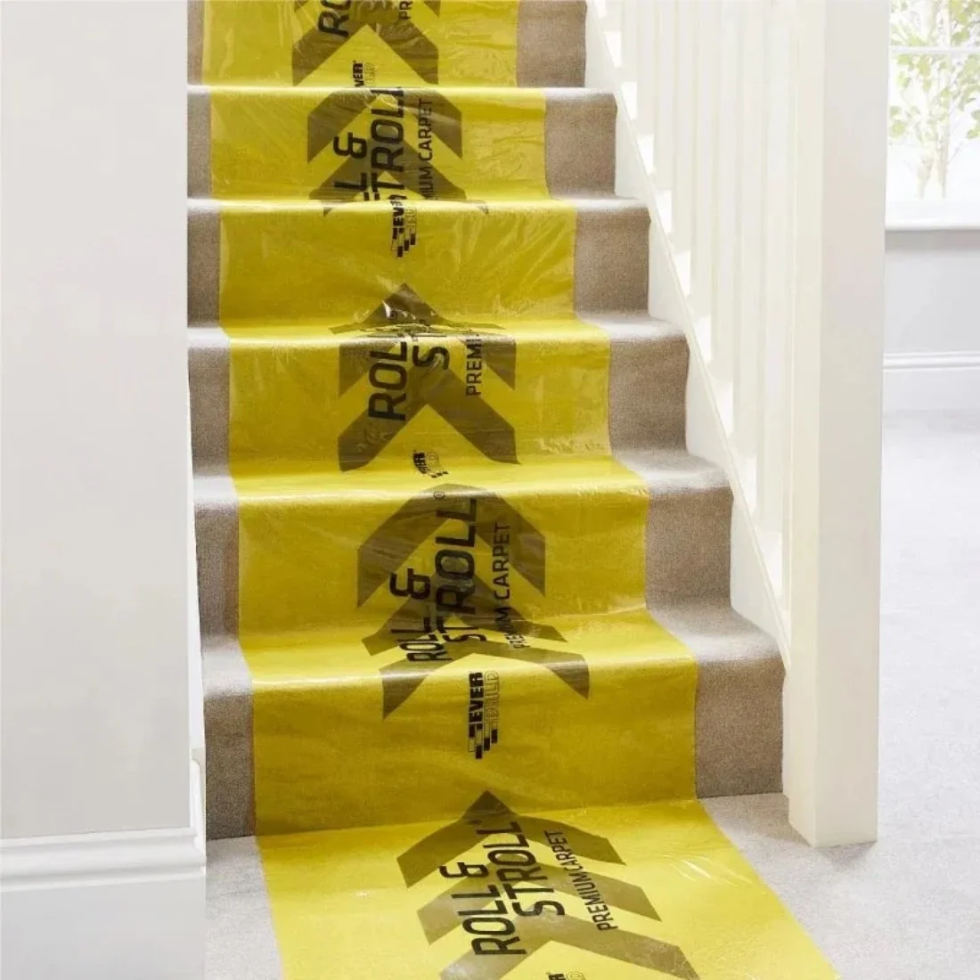 Protective carpet film applied on staircase to prevent damage during renovation work in a Halewood home