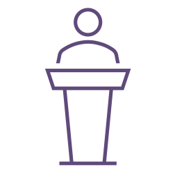 Line drawing of a person standing behind a podium