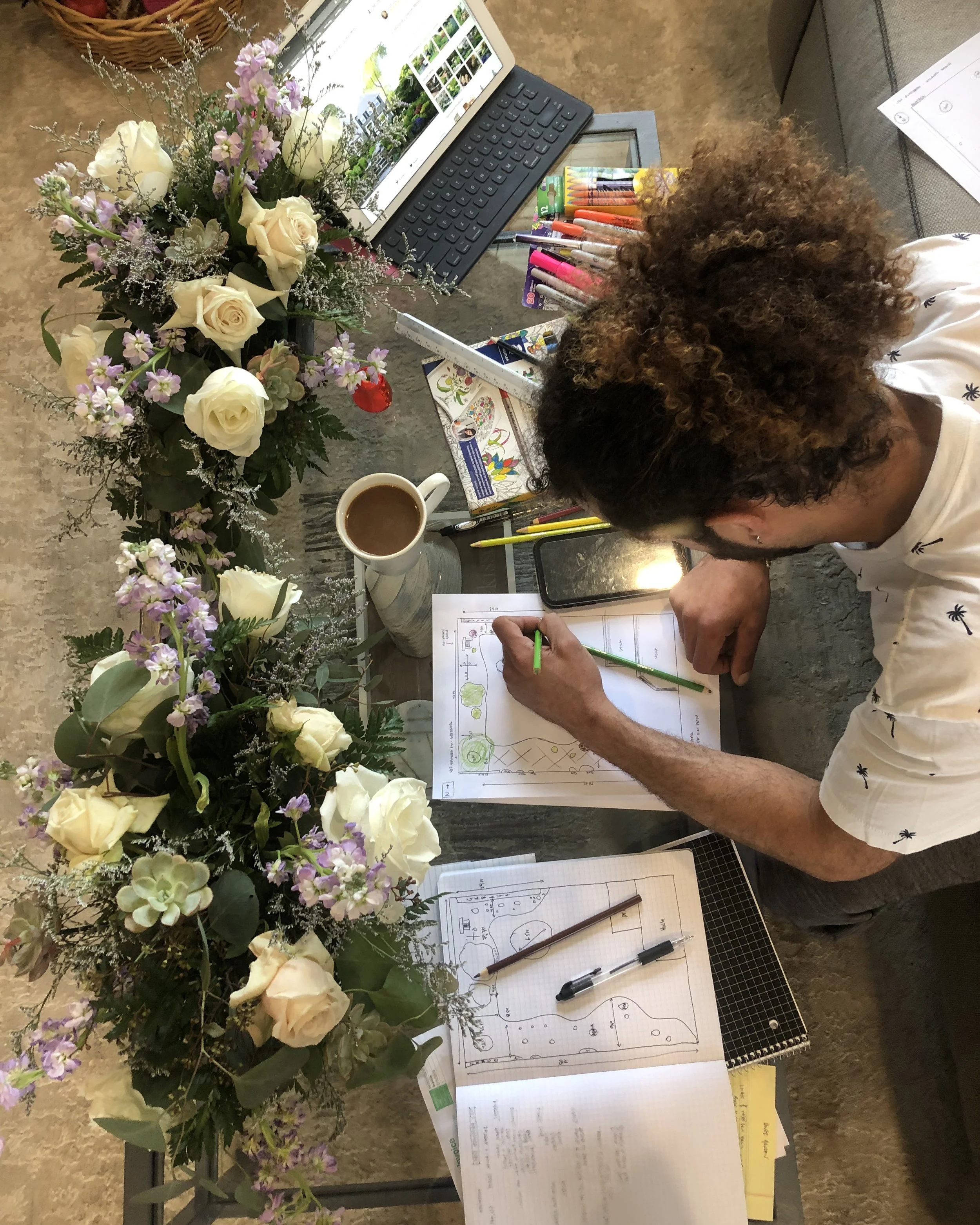 Leslie Chasky, landscape designer serving Atlantic Beach and Nassau County NY, sketching a custom outdoor planting design