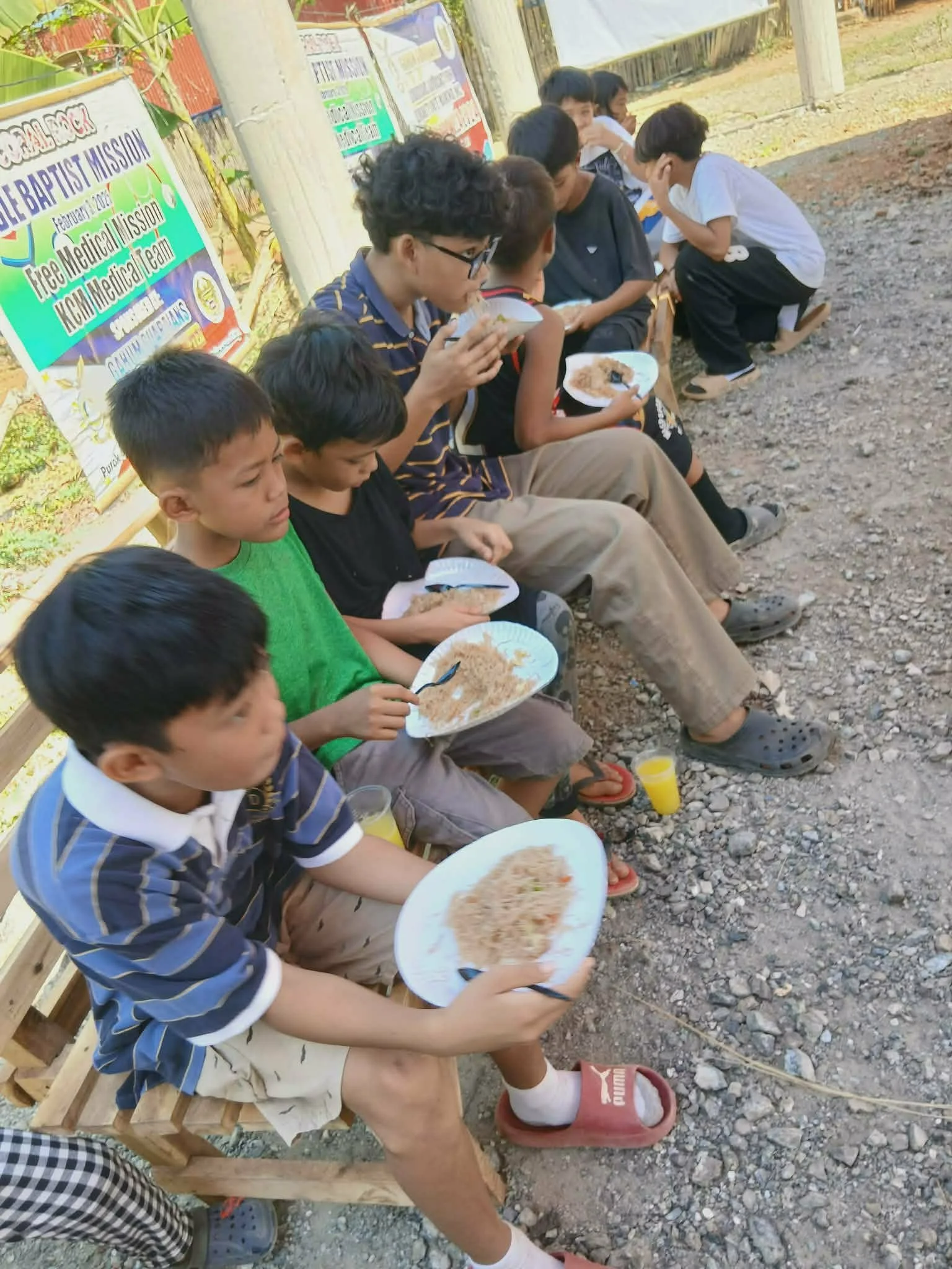 Group of children during one of our feeding programs