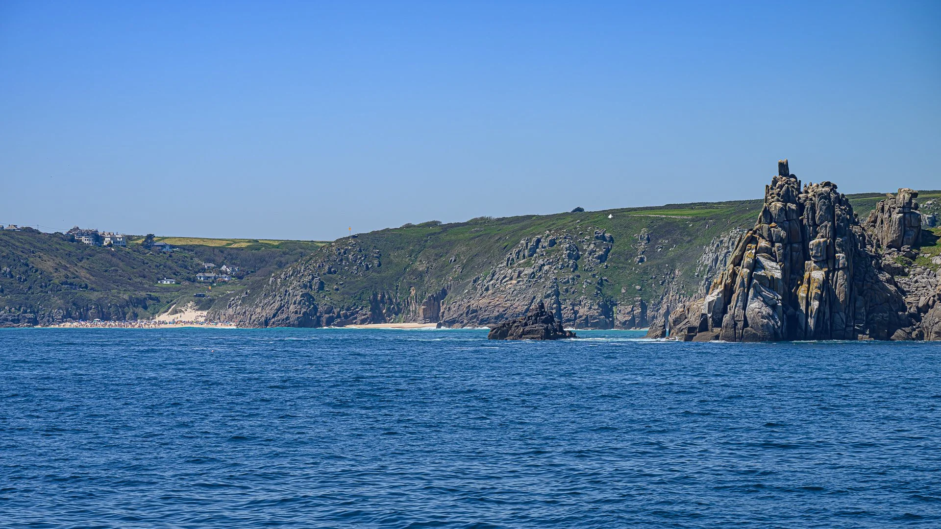 Porthcurno and Logan Rock on the left