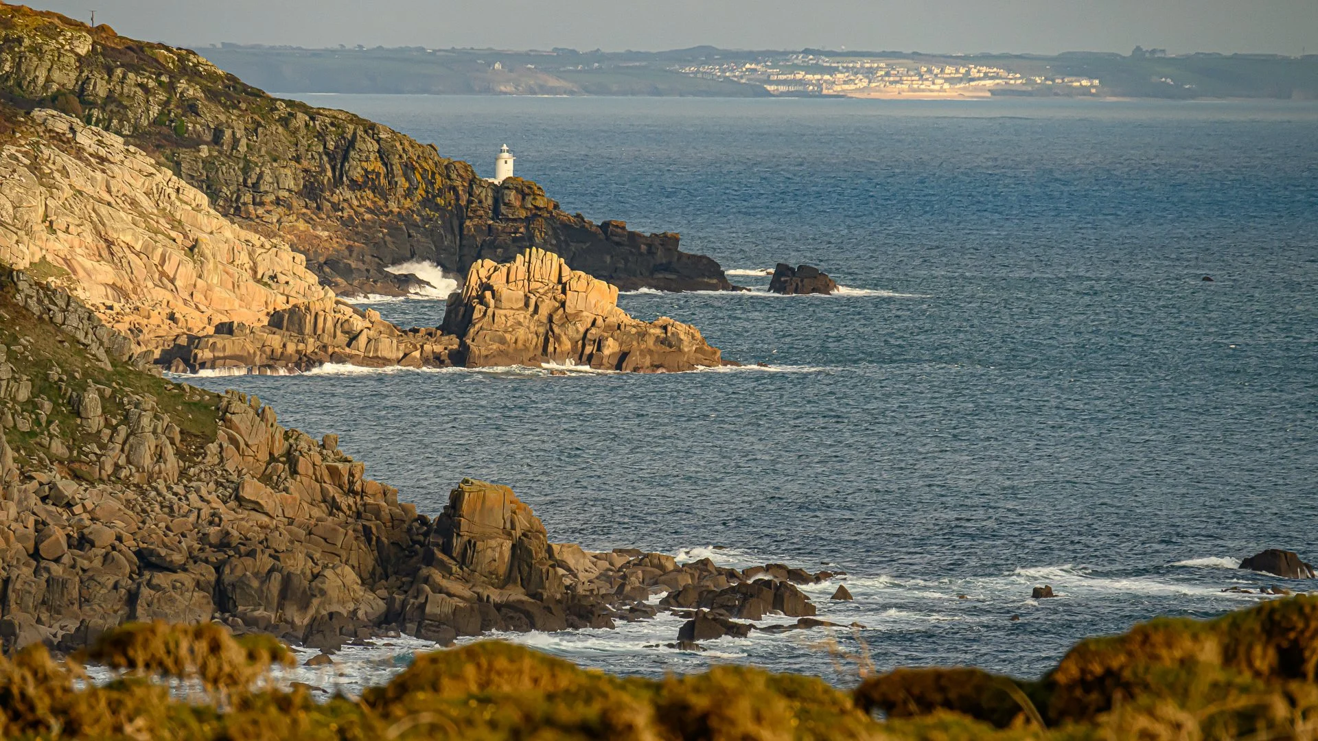 View from above Penberth looking towards Tater Du Lighthouse