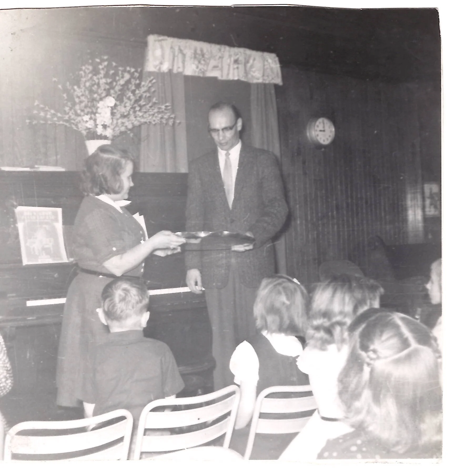 Farewell Party for Rev Roger Johnson, Pastor 1953-58, with Shirley Dexter presenting a gift