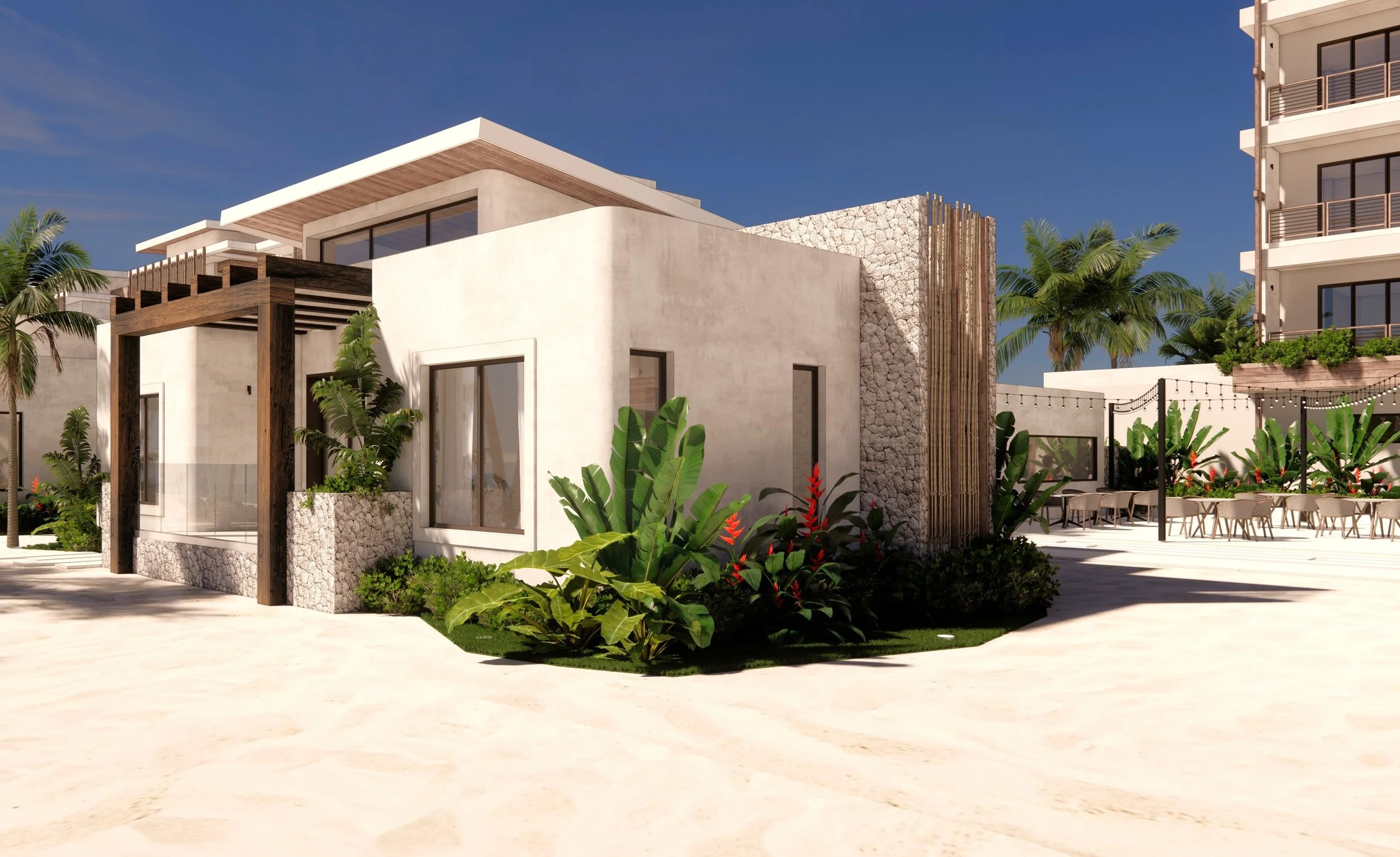 Modern white building with wooden accents, surrounded by tropical plants and palm trees, with a clear blue sky