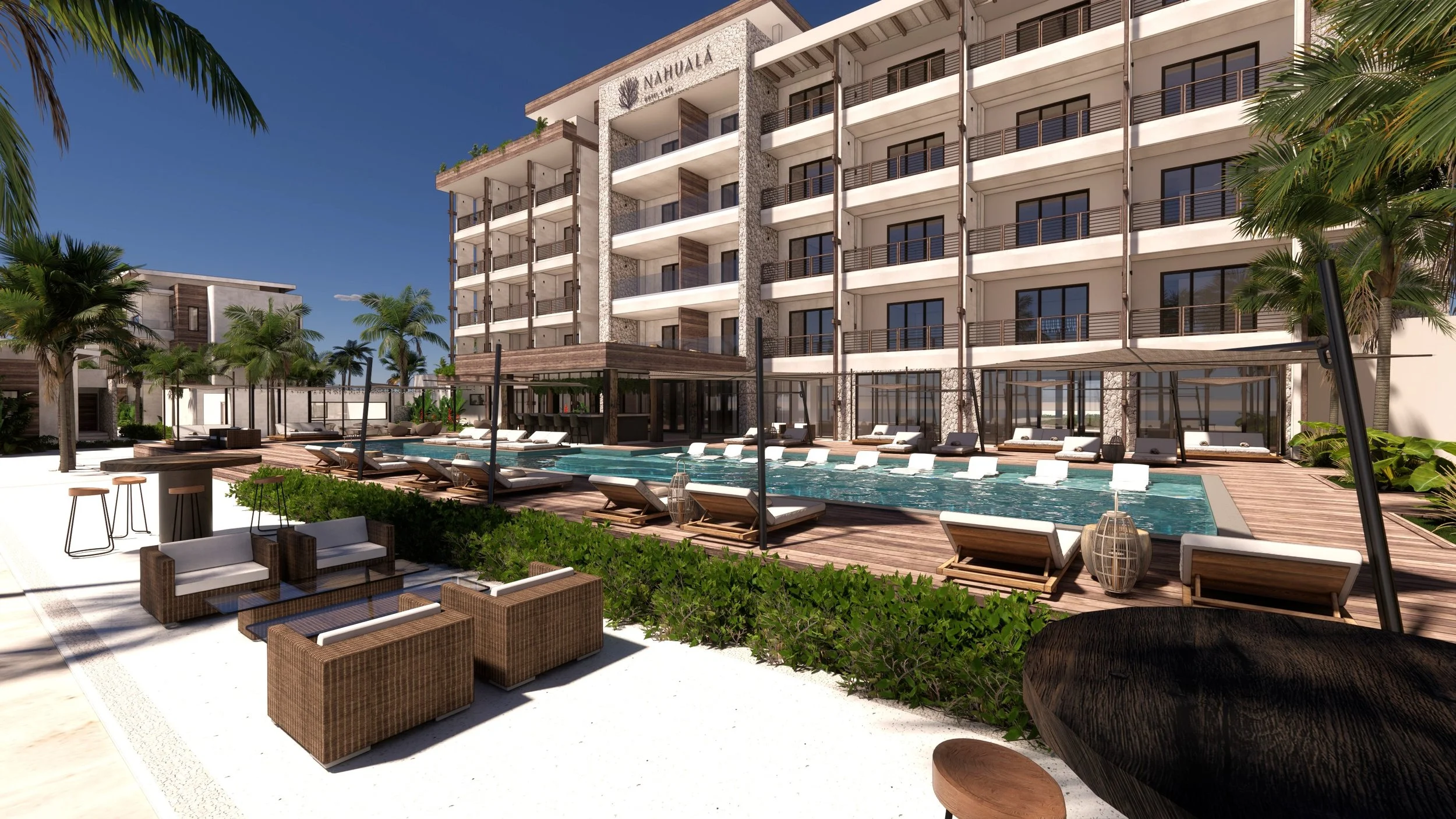 Modern hotel building with balconies around swimming pool area, surrounded by palm trees, lounge chairs, umbrellas, and outdoor furniture, under a clear blue sky.