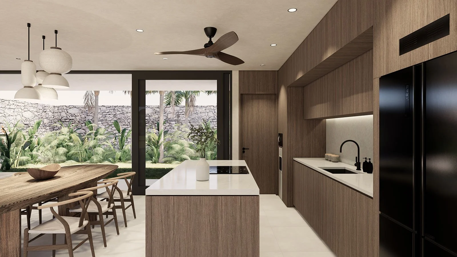 Modern kitchen with wooden cabinetry, black refrigerator, white countertop, black sink and faucet, and a view to a lush backyard through sliding glass doors.