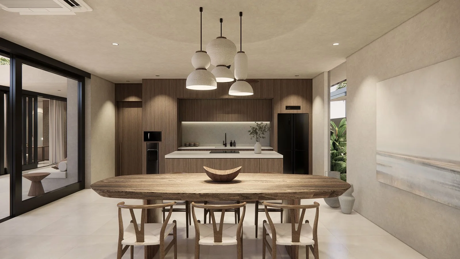 Modern kitchen with a wooden dining table and six chairs, hanging pendant lights, a dark refrigerator, a wooden cabinetry wall, and a sliding glass door leading to an outdoor patio.