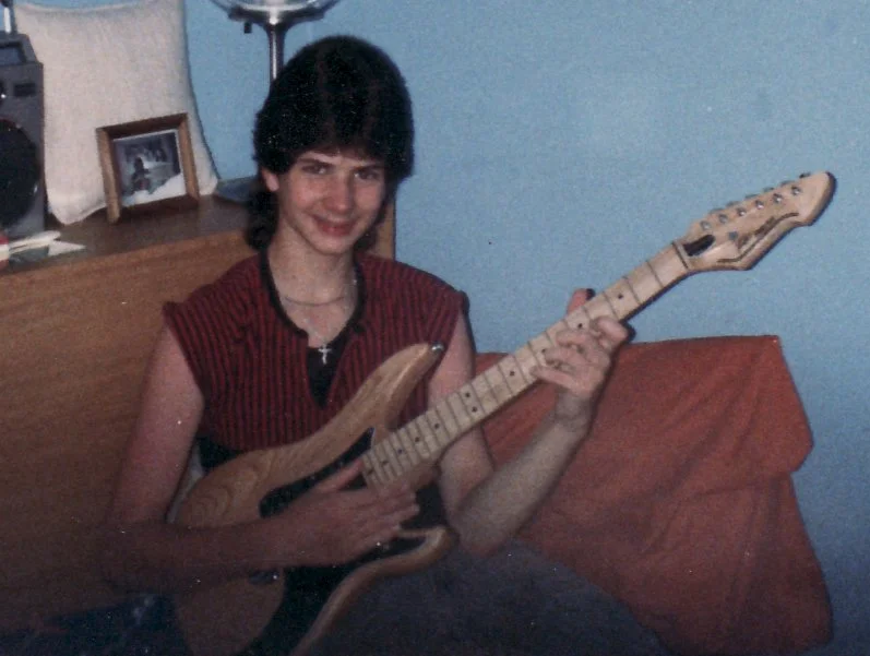 with my first electric guitar - a Peavey Patriot
