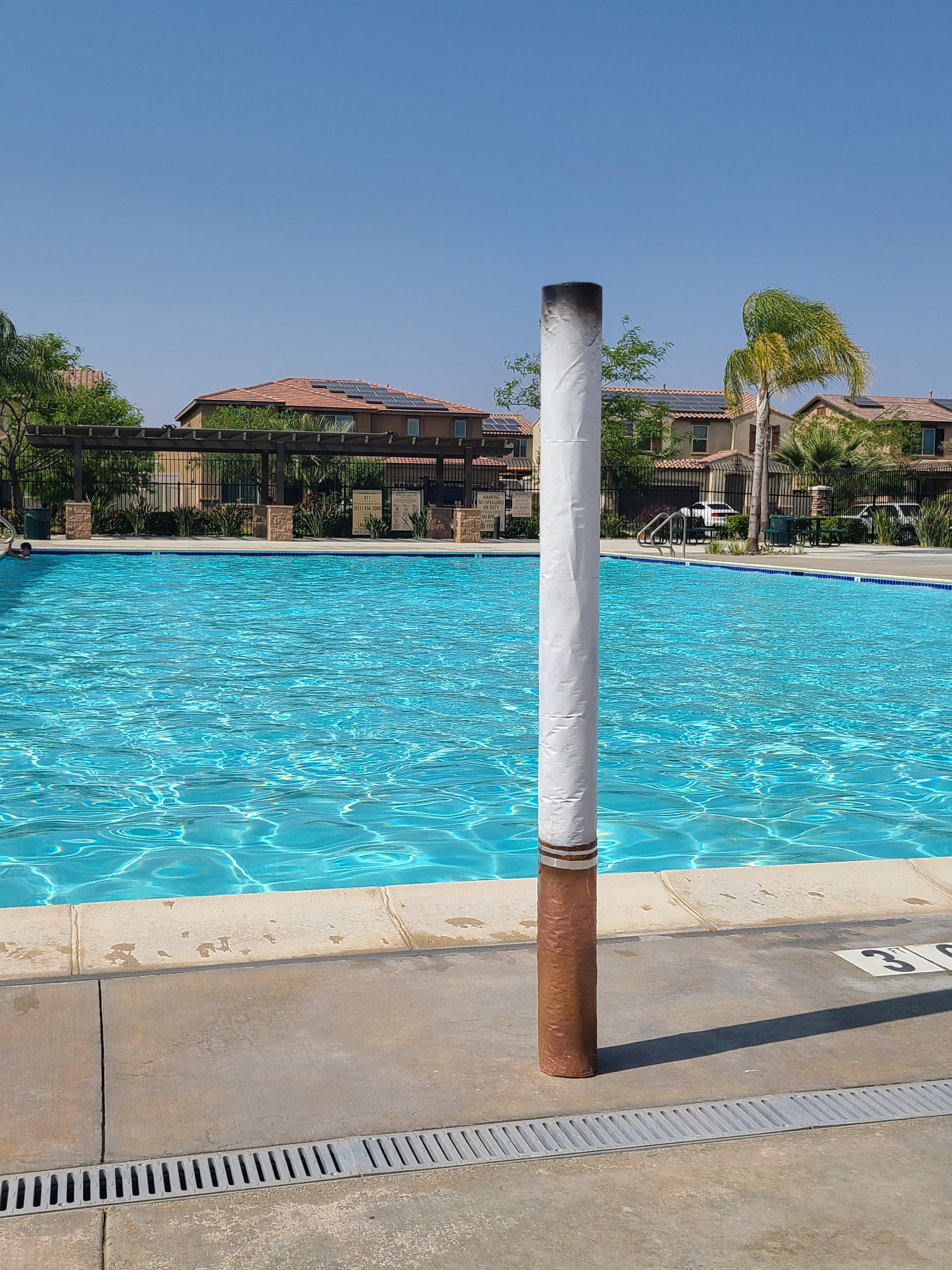 large cigarette at the pool