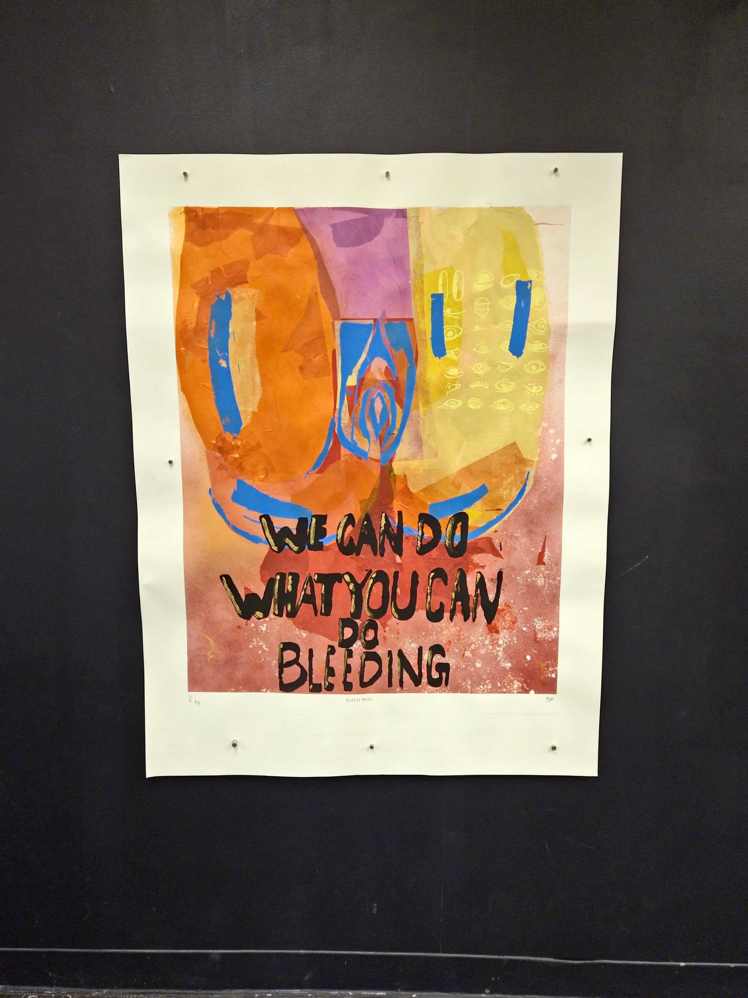 Colorful abstract artwork with text that reads: 'We can do what you can do bleeding' on a white mat background.