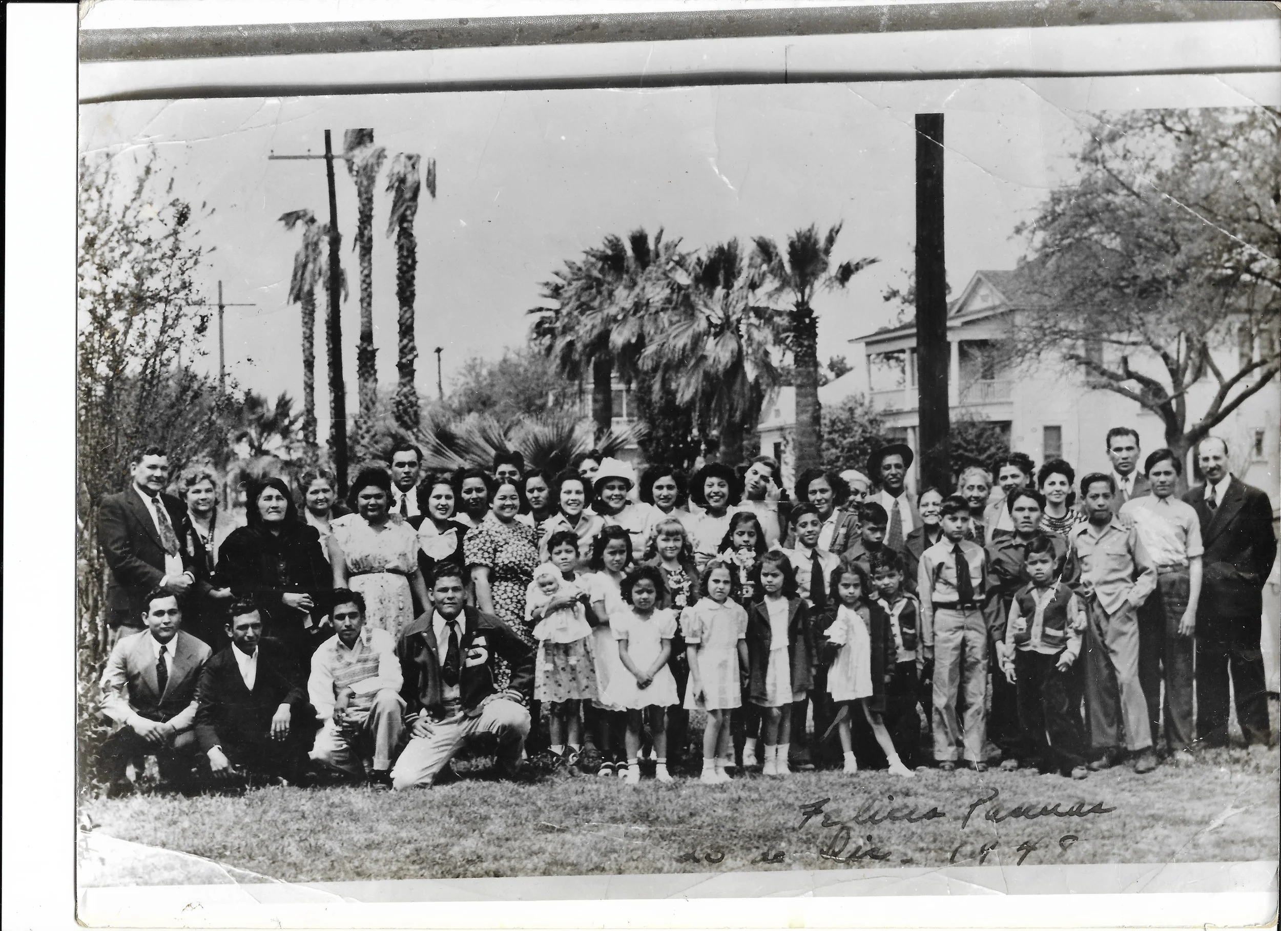 "Mi gente 1949, la familia y los amistades, my mom, dad at right, sister front in white ribbon..", Easter 1949
