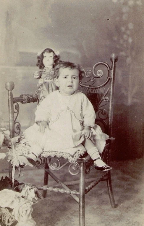 Lola, about 9 months old. Lola kept this porcelain doll for most of her life. María remembers seeing the doll when she was a teenager. 
