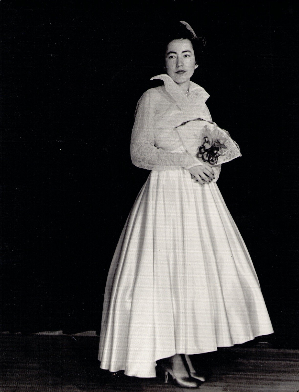 "Always a bridesmaid, never a bride." Lola served as a bridesmaid for several weddings, though she was never married herself.
