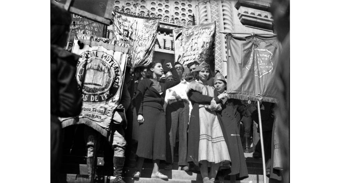 Workers Alliance leader Emma Tenayuca, speaking to a crowd outside San Antonio City Hall, Following a parade protesting the scarcity of Works Progress Administration jobs, March 8, 1937