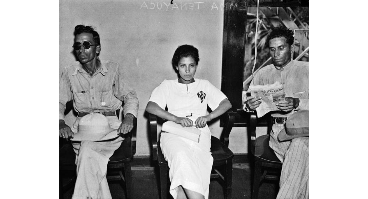 Emma Tenayuca waiting to meet with Mayor Charles K. Quin, about distribution of commodities left in surplus after the Texas Relief Commission completed its work, July 15, 1936