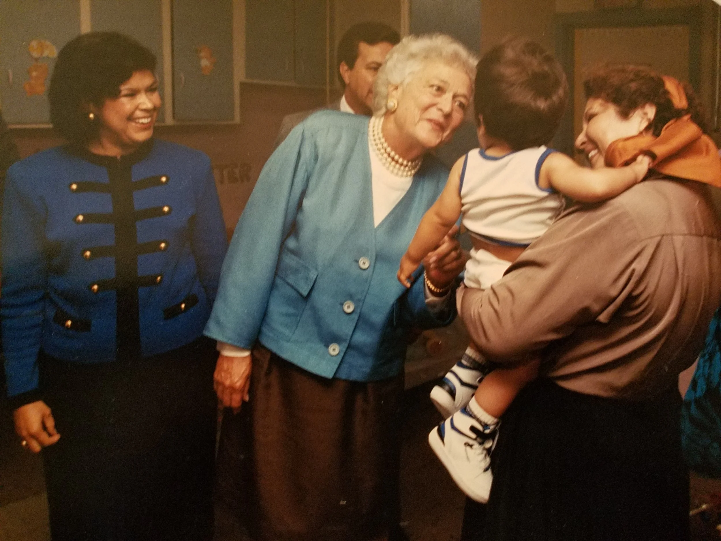  First Lady Barbara Bush visits AVANCE. She visited in both 1988 and 1989. Also pictured is Gloria's sister, Julia Garza. Julia worked at AVANCE for 32 years, got her degree, rose to head the Del Rio Eagle Pass AVANCE chapters, and helped open the Lo