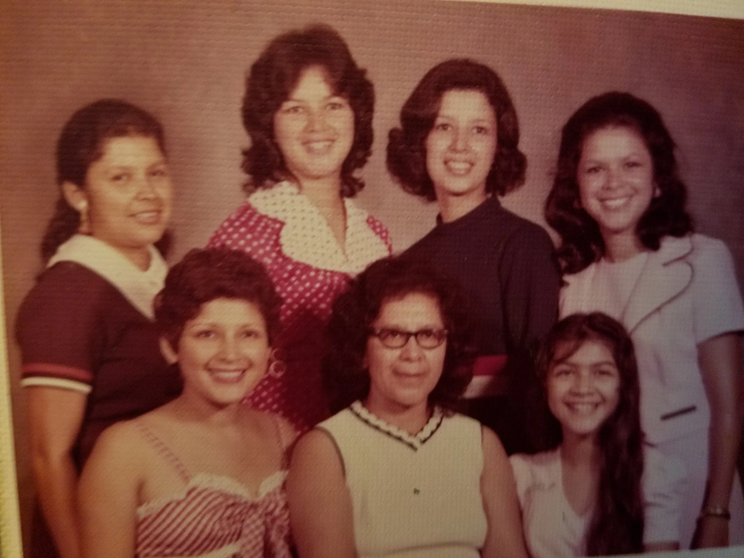Gloria with her mother and sisters. Her mother and sisters provided tremendous support while running this multimillion-dollar organization. 