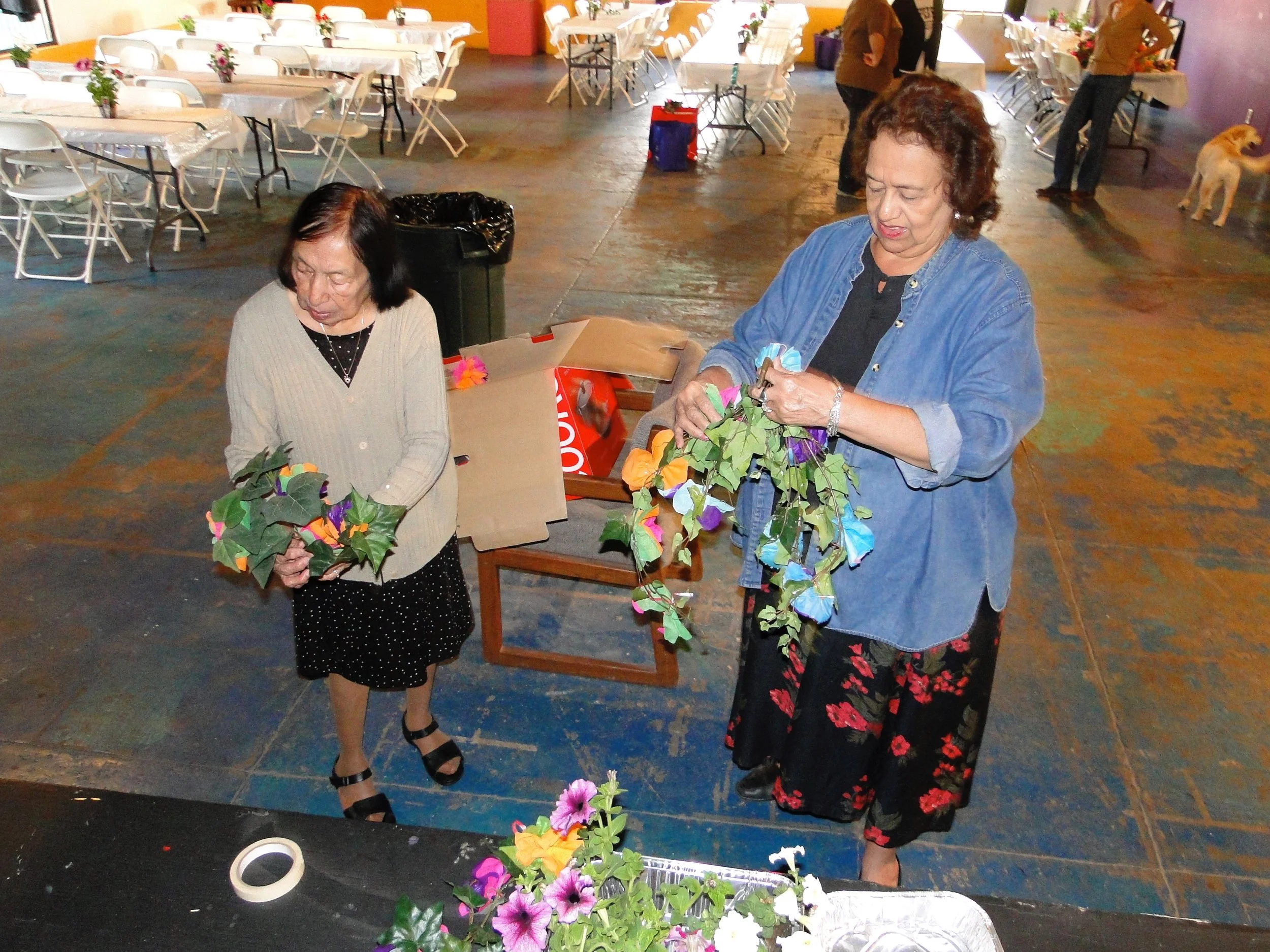 Isabel Sanchez and Amelia Fuentes, prepping for the annual Lanier High School fundraiser and scholarship baile, Courtesy Graciela Sánchez y familia 