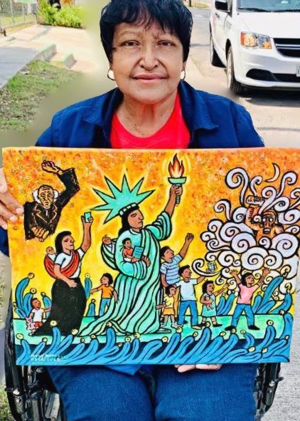 Rodríguez holding her "Libertad" Painting, Courtesy of Mary Agnes Rodríguez 