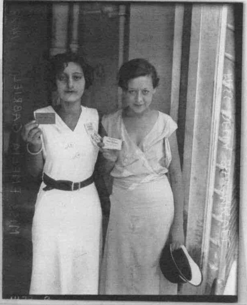 Emelia Gabriel and Della San Miguel holding tickets to be sold for benefit dance at Mexican casino to raise funds for striking workers. August 19, 1933.
