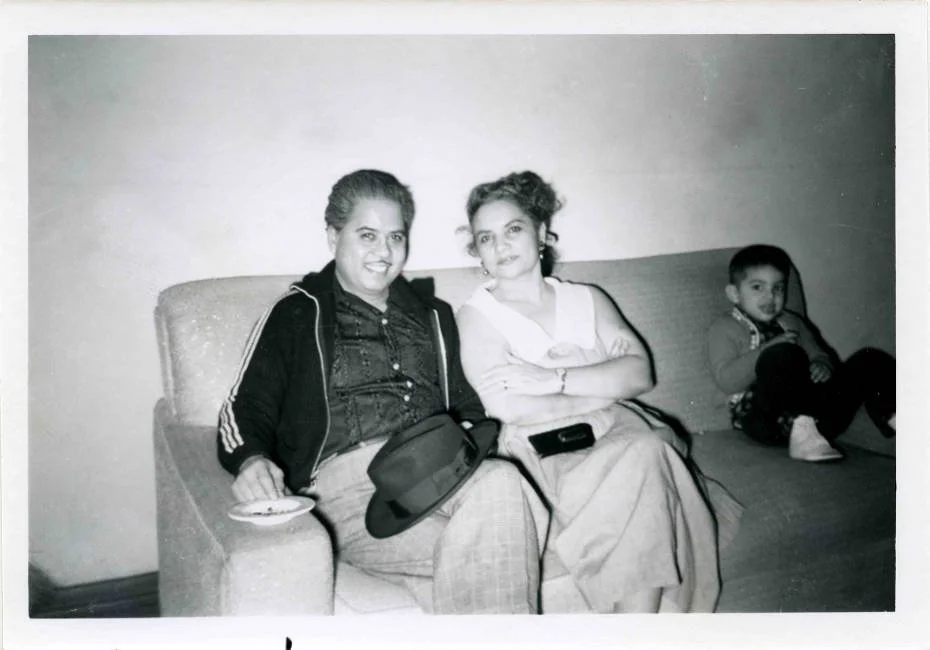 Lydia Mendoza with Fred Martinez, Lydia sitting with her second husband, Fred Martinez, and unidentified child, undated. 