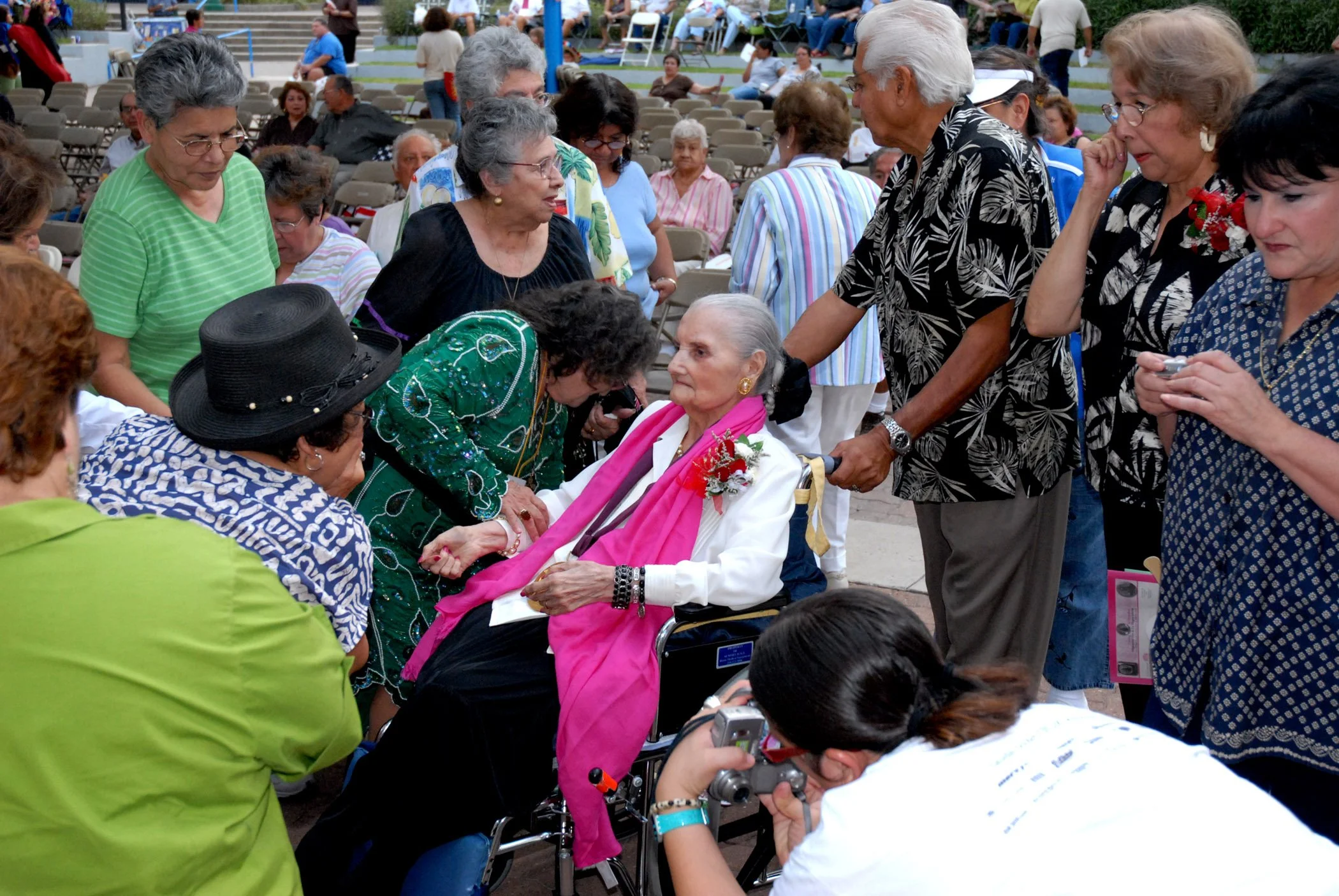 Lydia surrounded by fans, homenaje to Lydia, 2006. 90th birthday celebration for Lydia Mendoza, held at Plaza Guadalupe. 