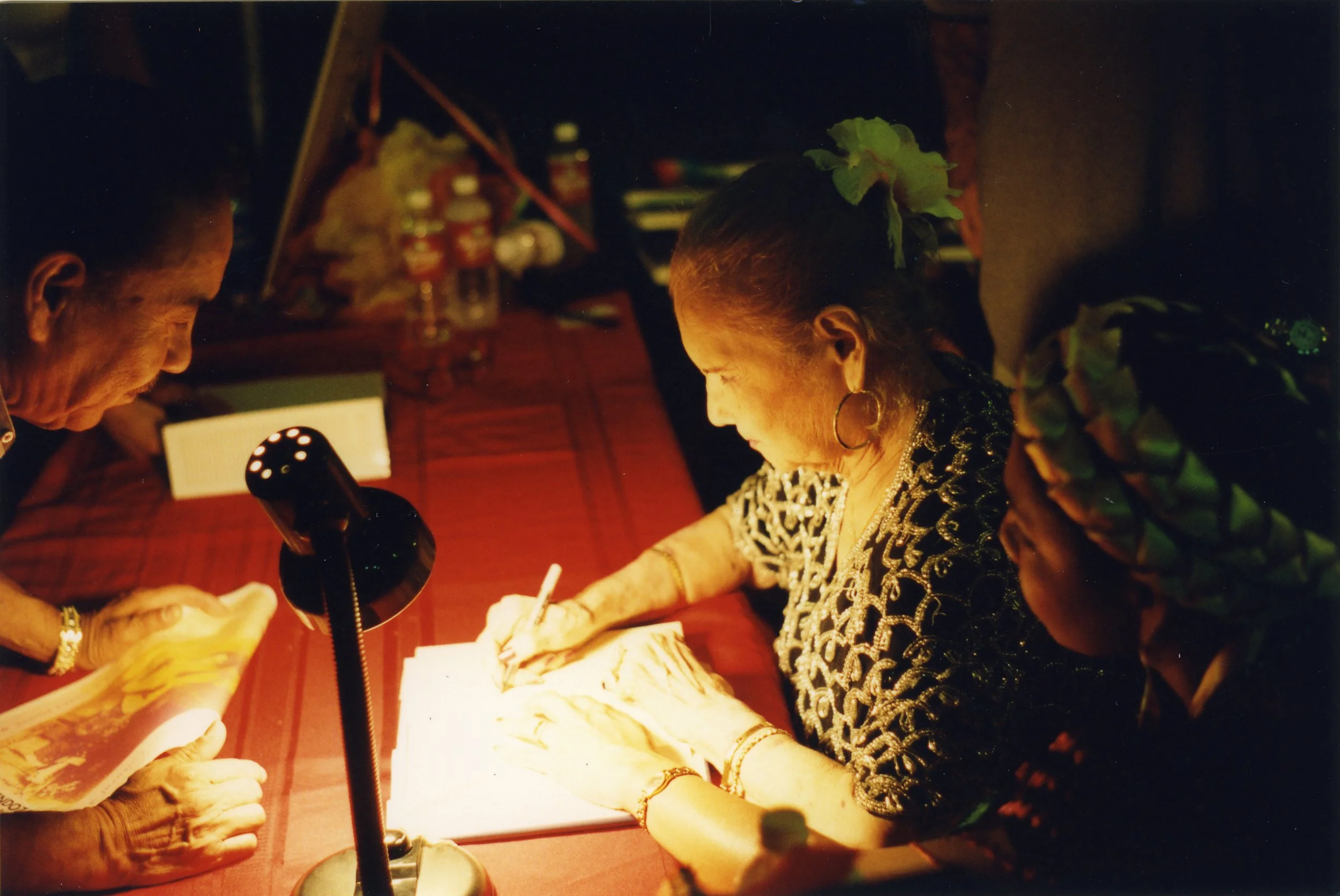 Lydia signing autographs, Homenaje to Lydia, Esperanza Peace &amp; Justice Center 