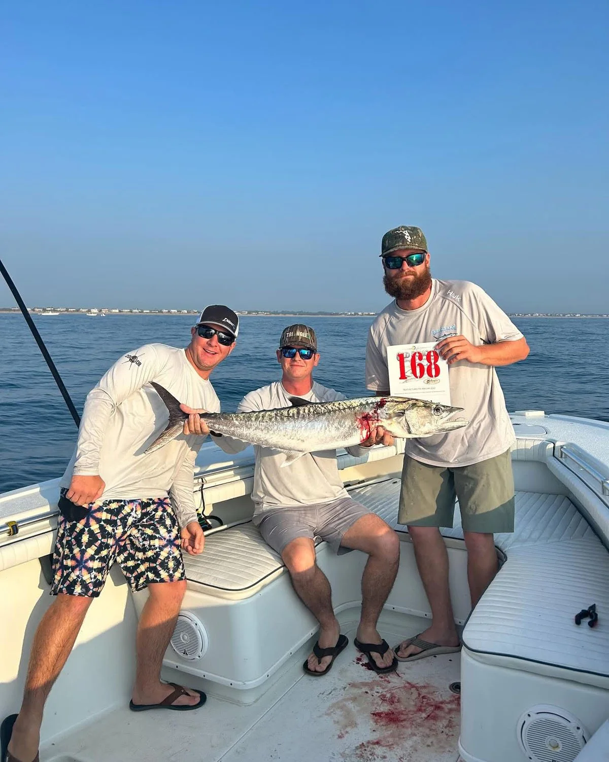 Kingfish Shootout Fishing Tournament showing fishermen and their kingfish.