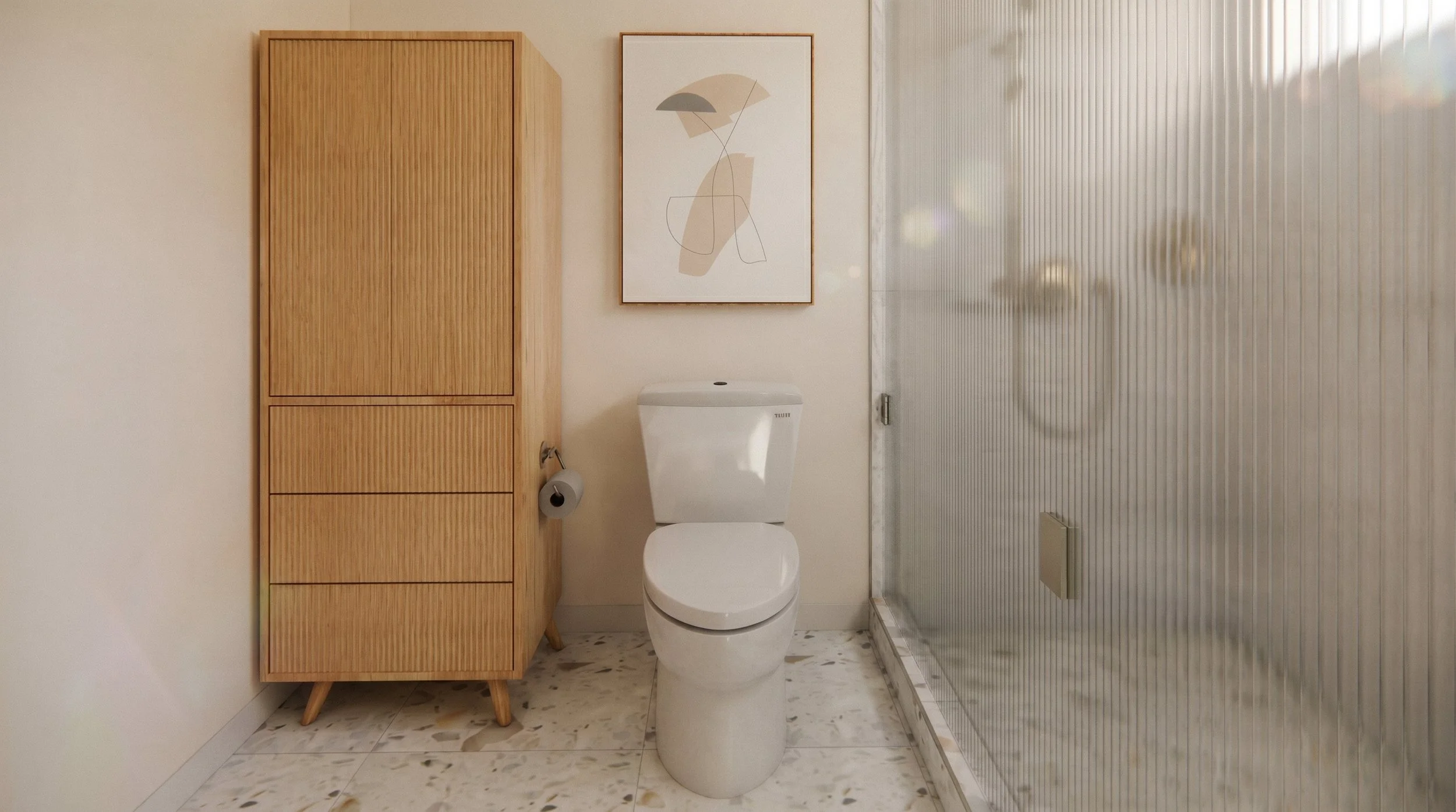 A modern bathroom with a white toilet, wooden cabinet, framed abstract art, and a glass shower with textured panels.