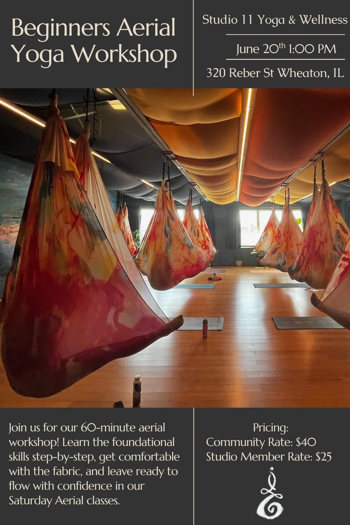 Aerial yoga studio with orange and red fabric hammocks hanging from the ceiling, wooden floor, and large windows letting in natural light.