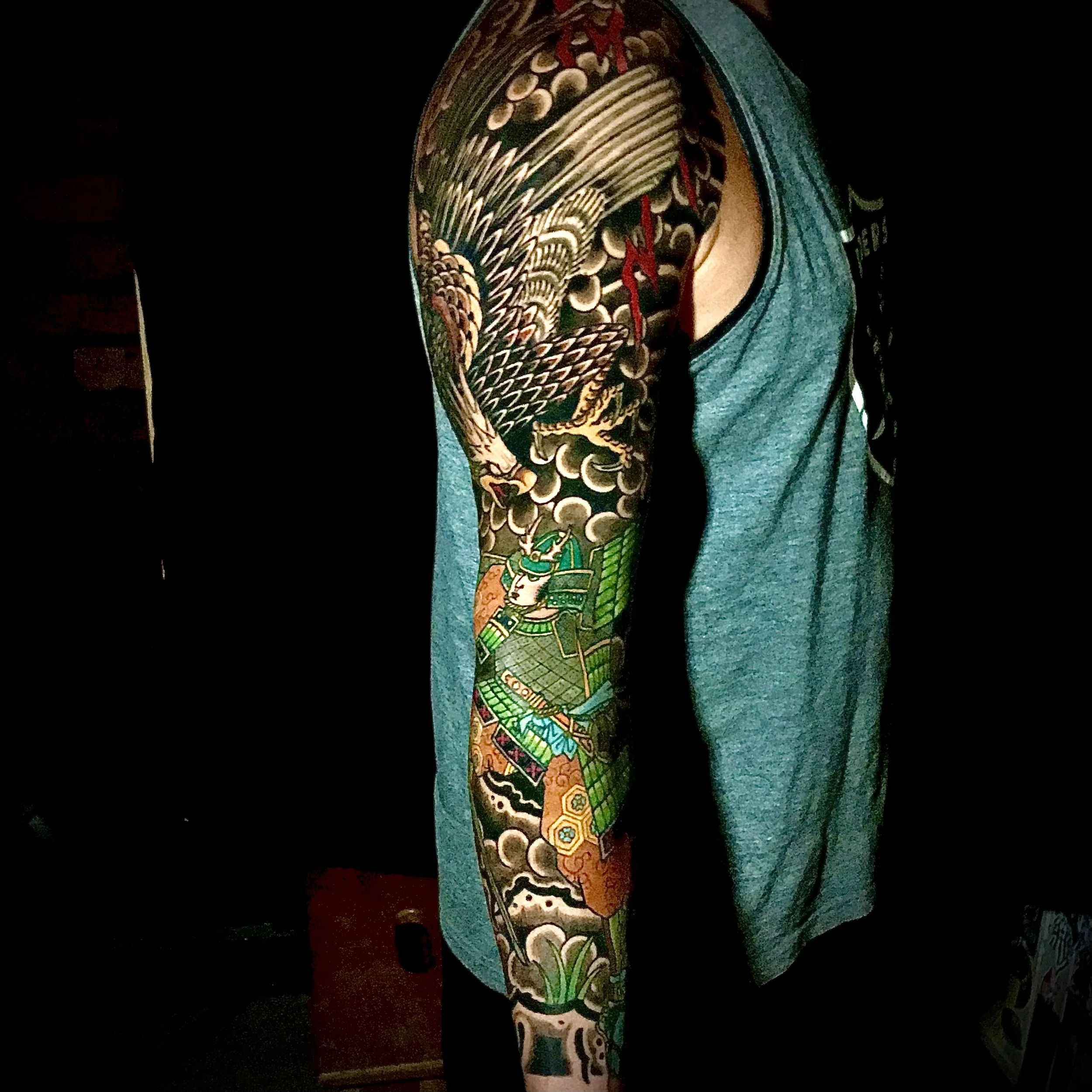 Samurai fighting eagle. tattoo, sleeve