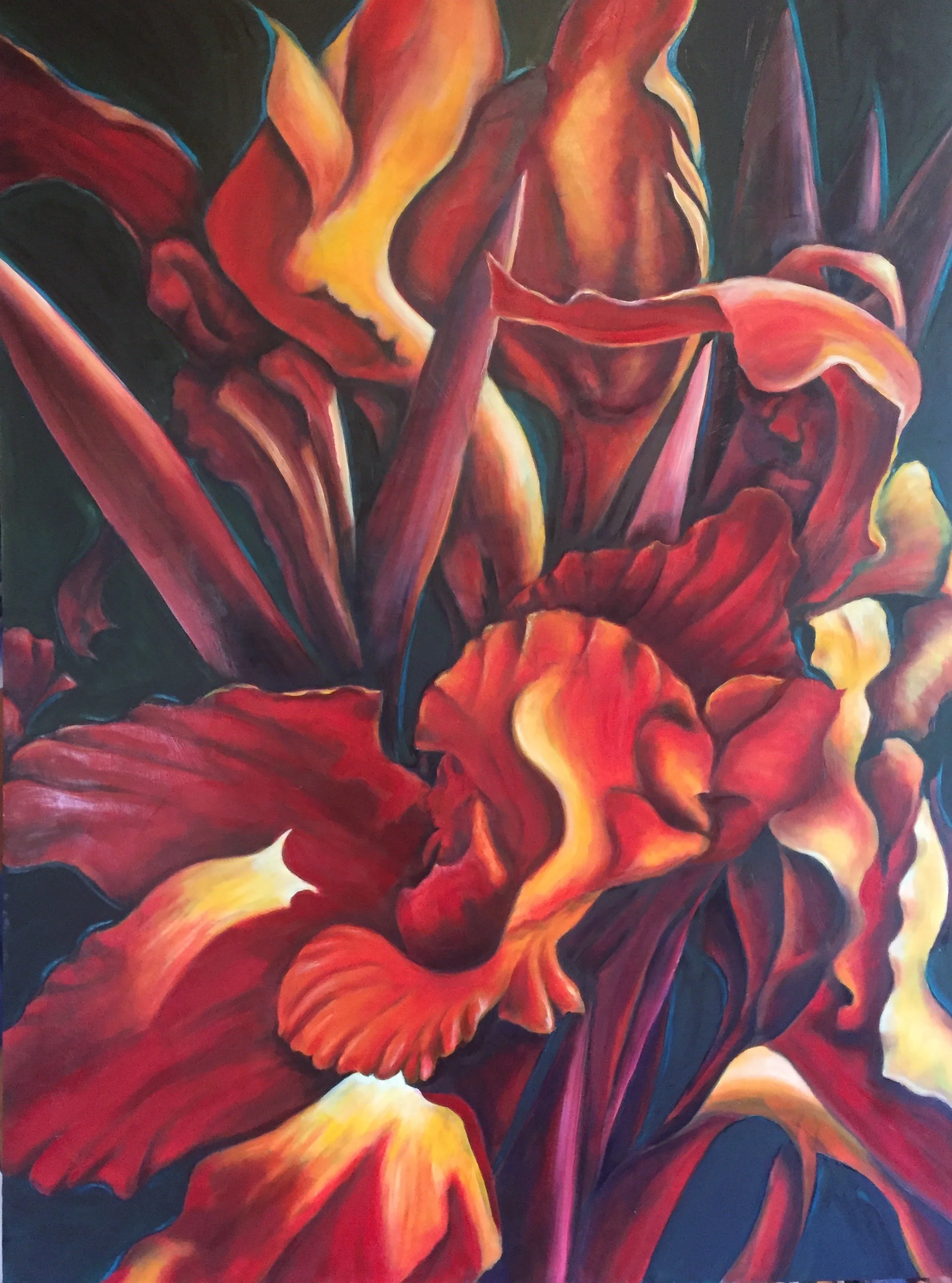 Close-up of a colorful abstract painting of a flower with red, orange, yellow, and purple hues.