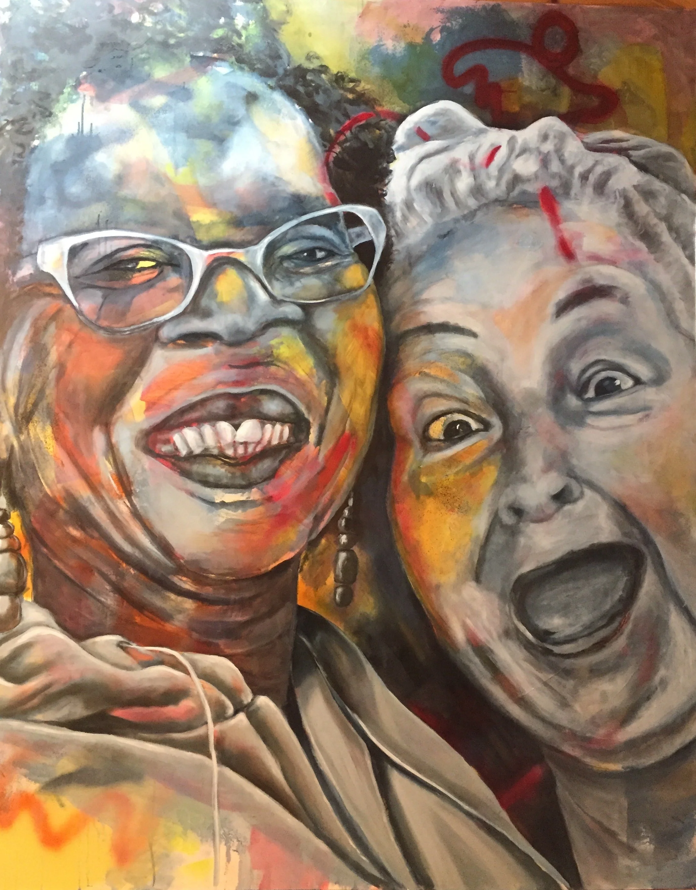 Close-up of a colorful painting depicting two laughing women, one wearing glasses and the other with hair tied back. The vibrant brushstrokes highlight their expressive faces filled with joy.
