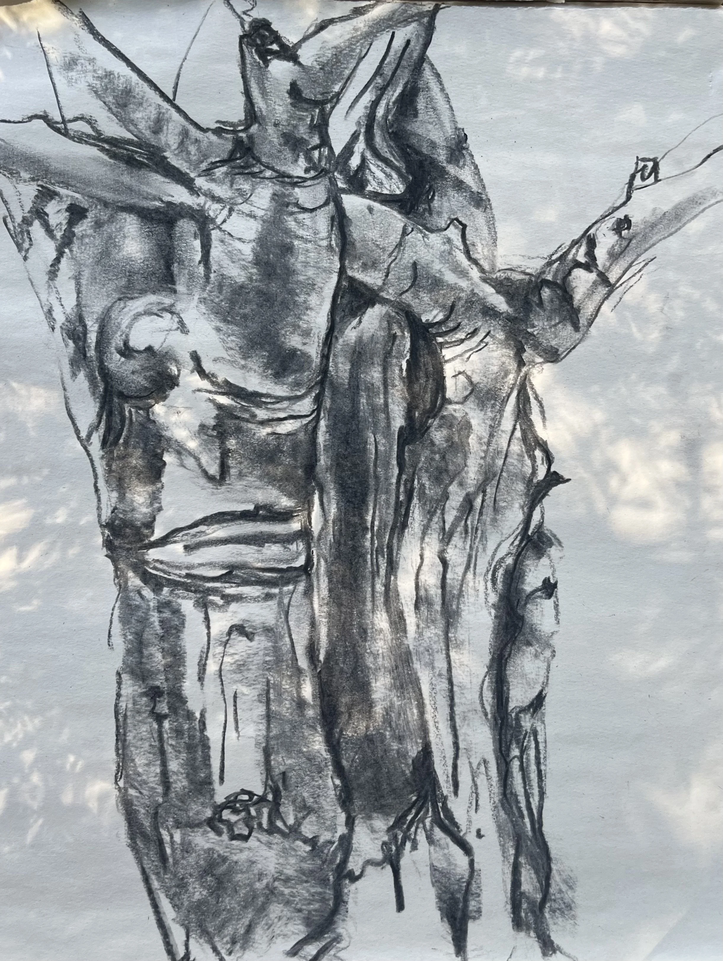 Sketch of Jesus Christ crucified on the cross, with a hand reaching out and a crown of thorns on his head, drawn in black and white.
