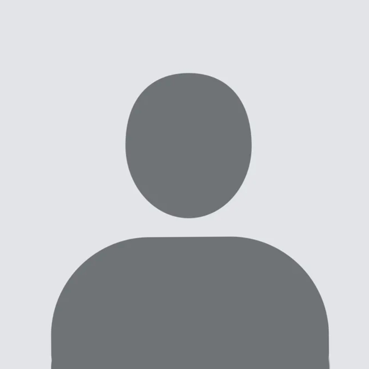 Gray silhouette of a user profile with a circular head and rounded shoulders, on a light gray background.