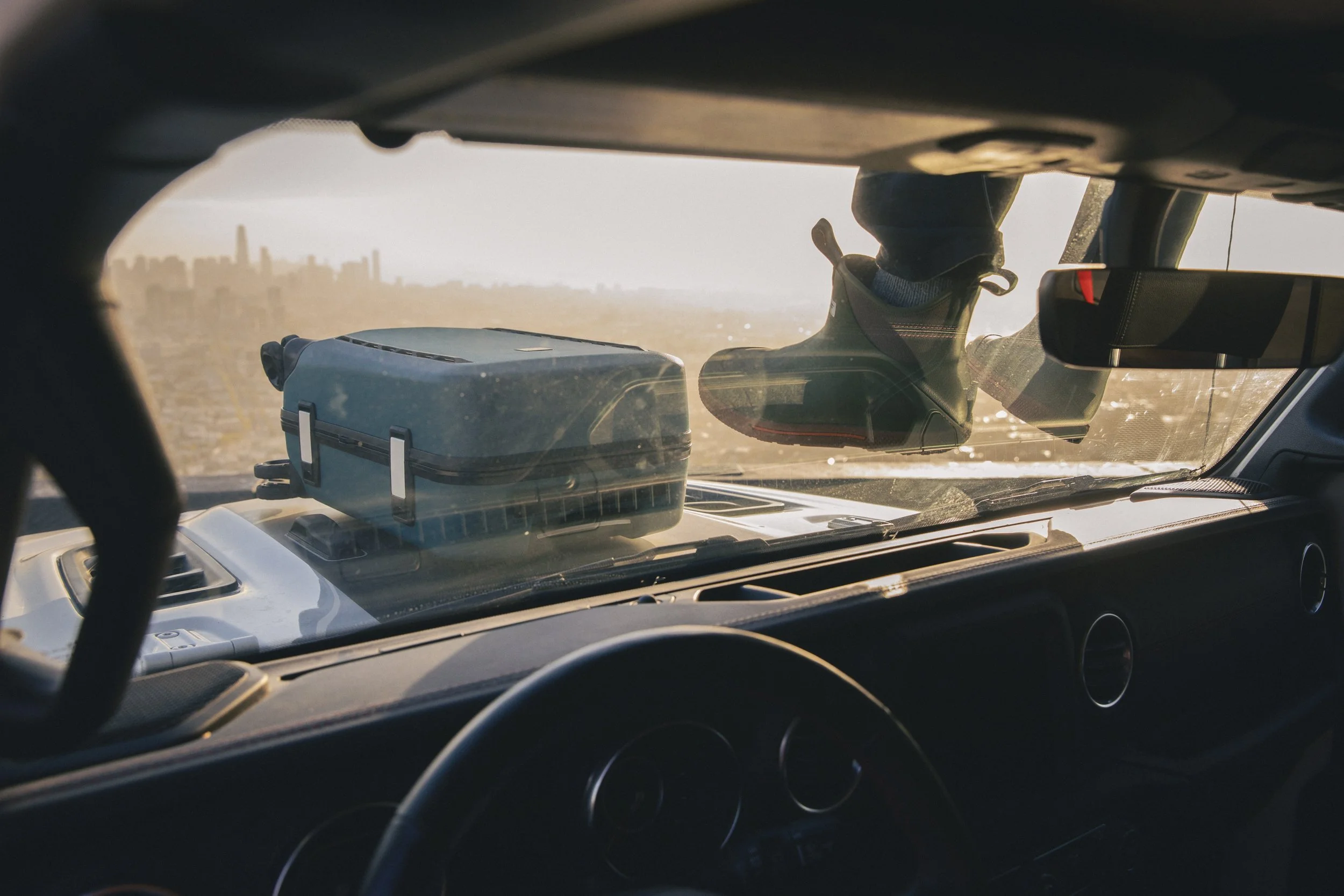 4-bay-area-commercial-photographer-product-lifestyle-osprey-luggage-feet-on-hood.jpg