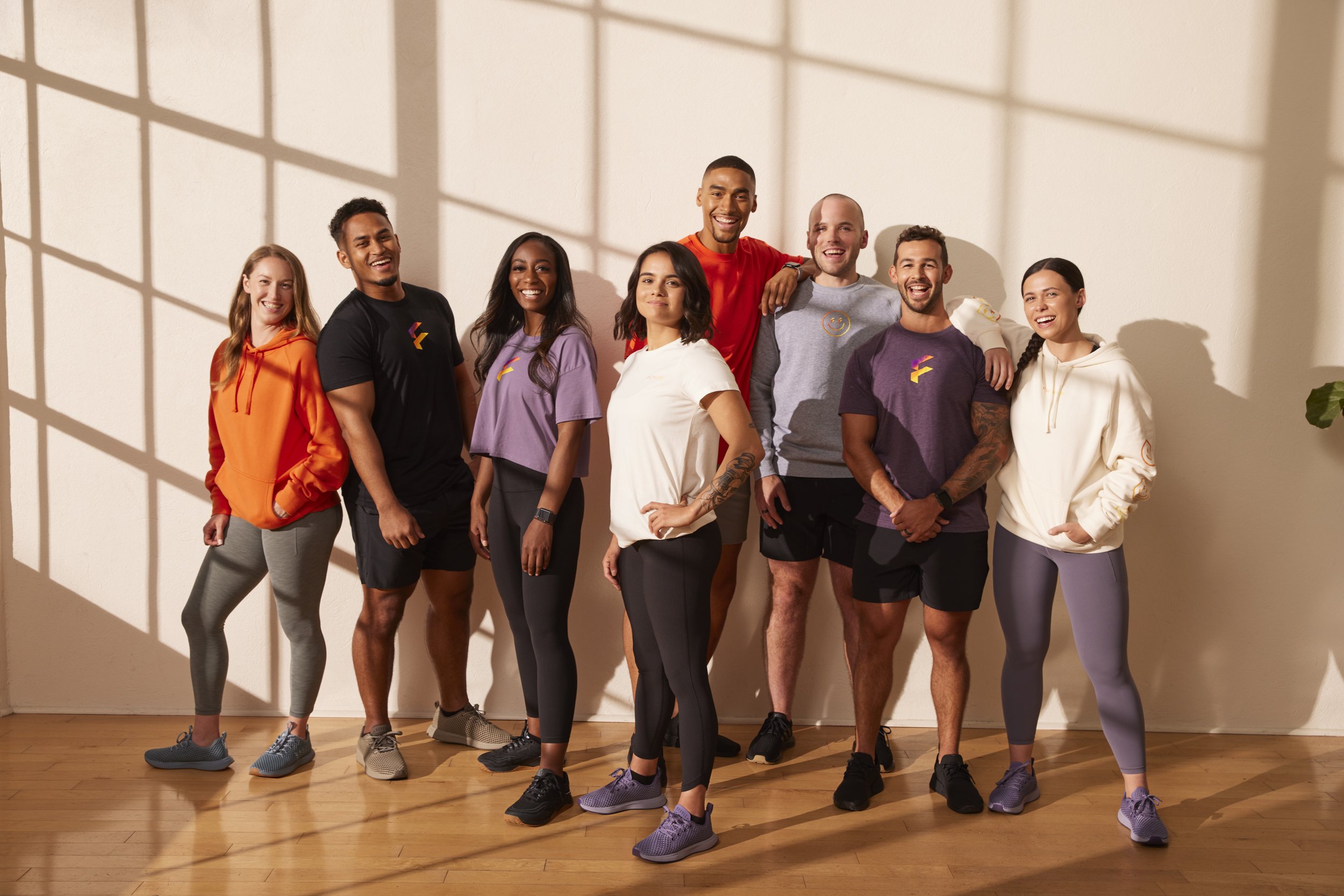3-California-Commercial-Fitness-Photographer-San-Francisco-future-fitness-app-indoor-studio-sunset-window-team-portrait-apparel.jpg