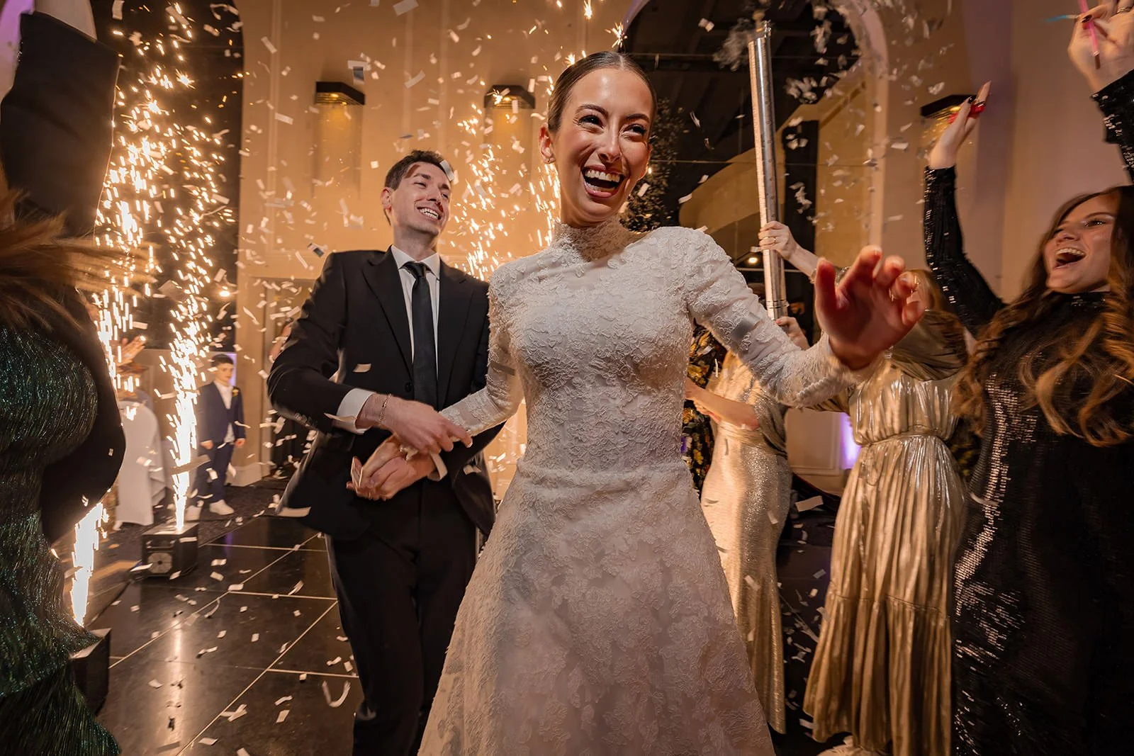 bride and groom make entrance with fireworks to wedding reception party at mercure manchester piccadilly