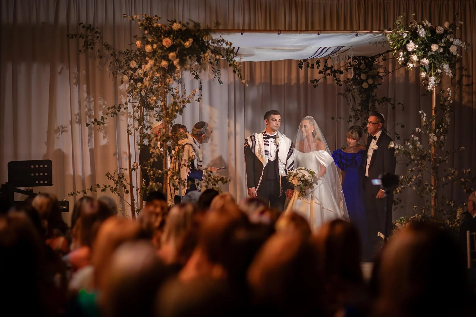 bride and groom exchange vows during wedding ceremony at manchester deansgate hotel