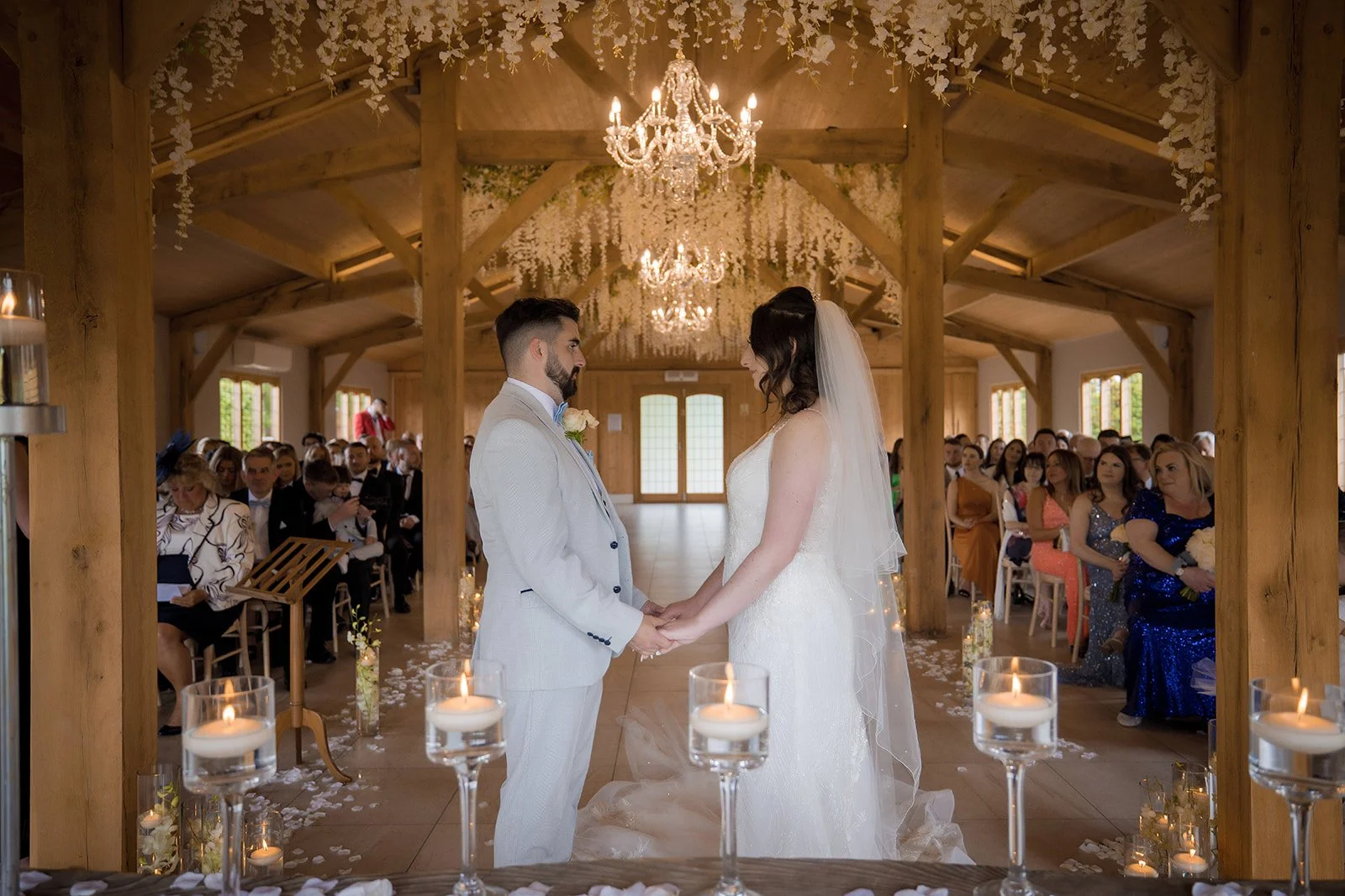 Merrydale Manor wedding bride groom exchanging vows holding hands – Manchester wedding photographer