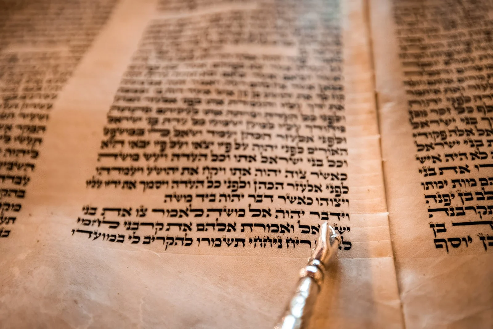 detail shot of torah hebrew writing for barmitzvah in synagogue