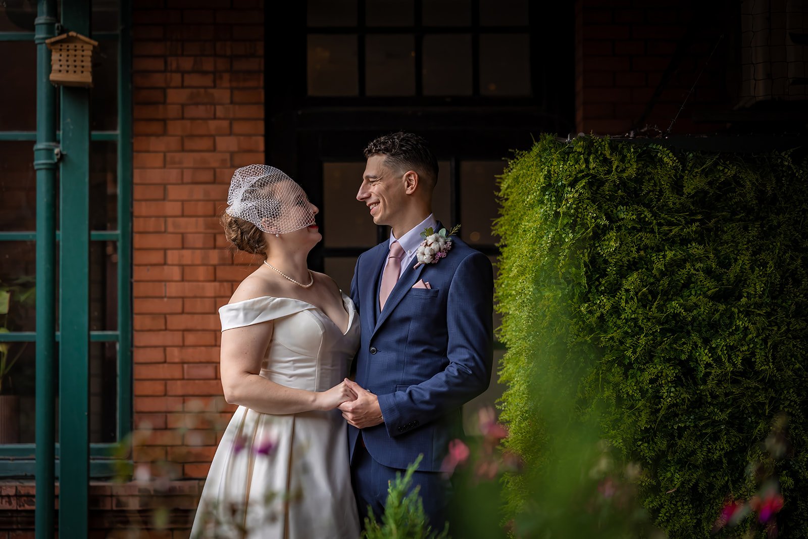 bride and groom newlywed couple portrait at kimpton clocktower manchester