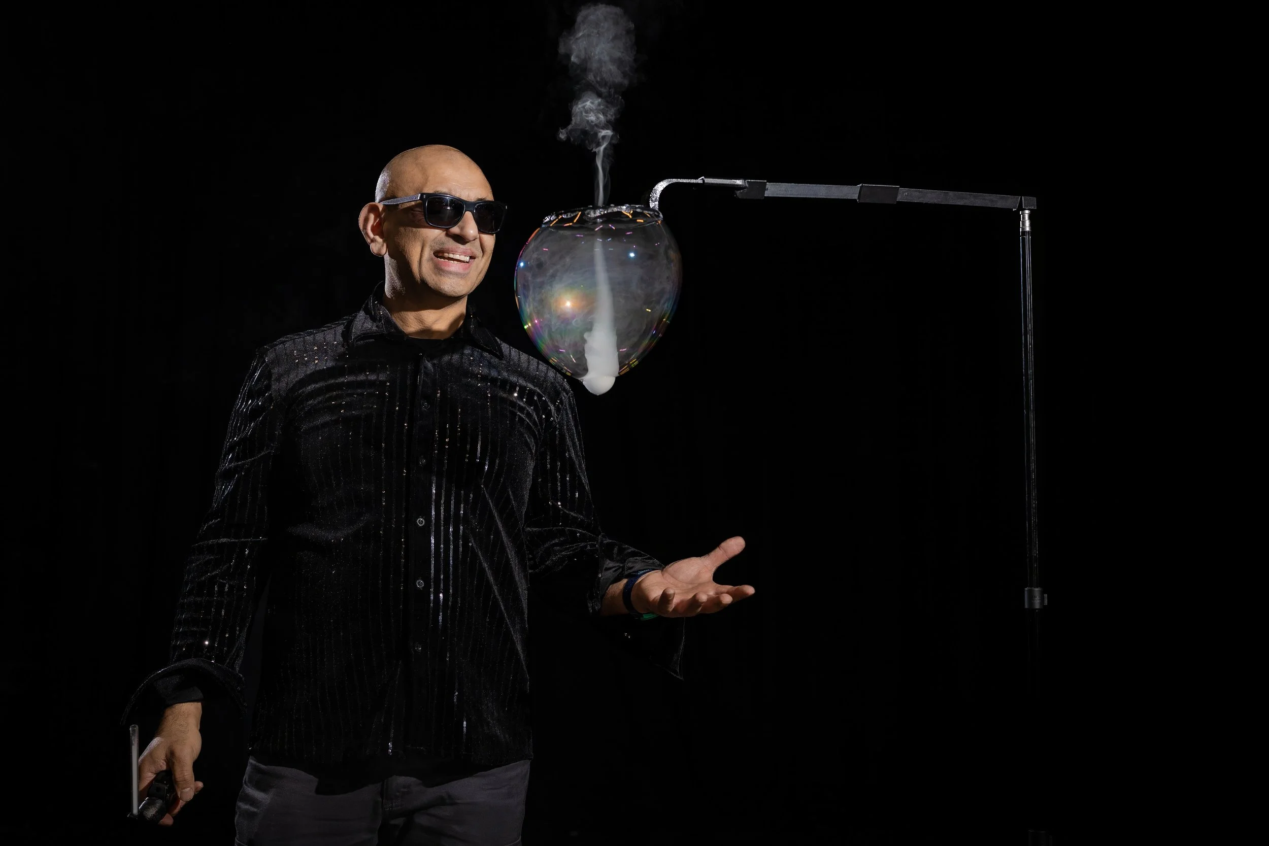 pr-photographer-manchester-bubble-performer-smoke-bubble-rig-smiling-006.jpg