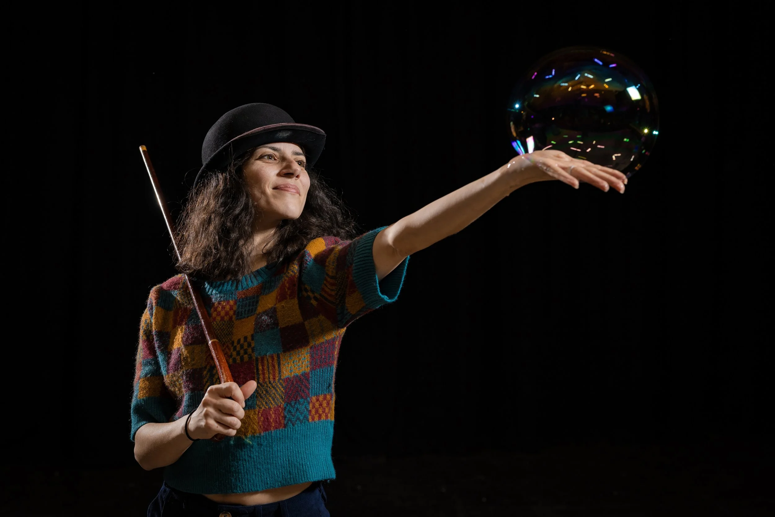 corporate-workshop-photographer-manchester-participant-bowler-hat-spinning-bubble-025.jpg
