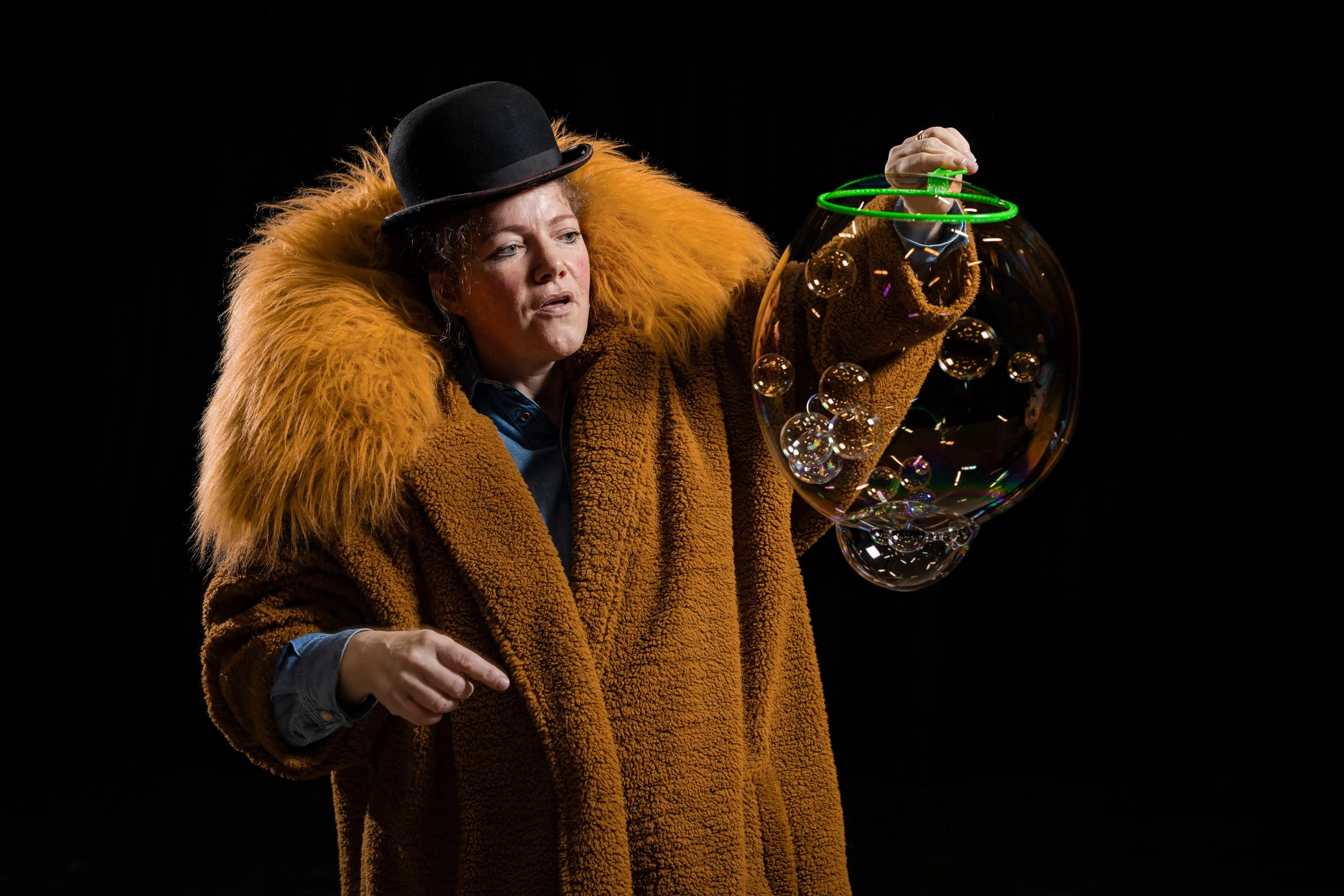 corporate-workshop-photographer-manchester-participant-fur-coat-bowler-bubble-wand-015.jpg